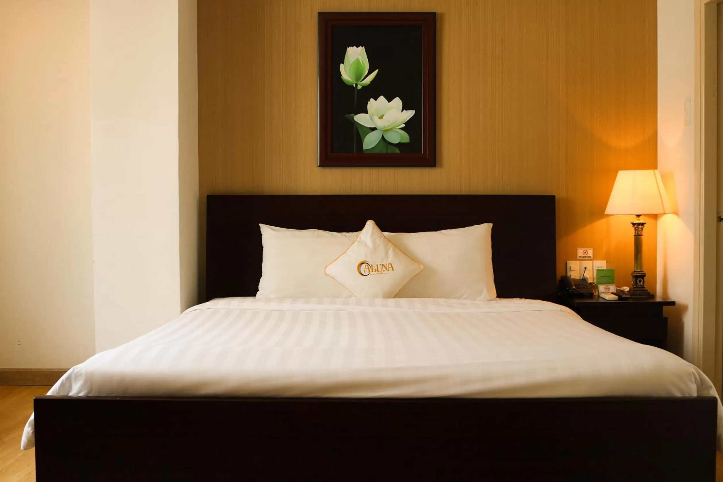 Bed in ALUNA Ben Thanh Hotel