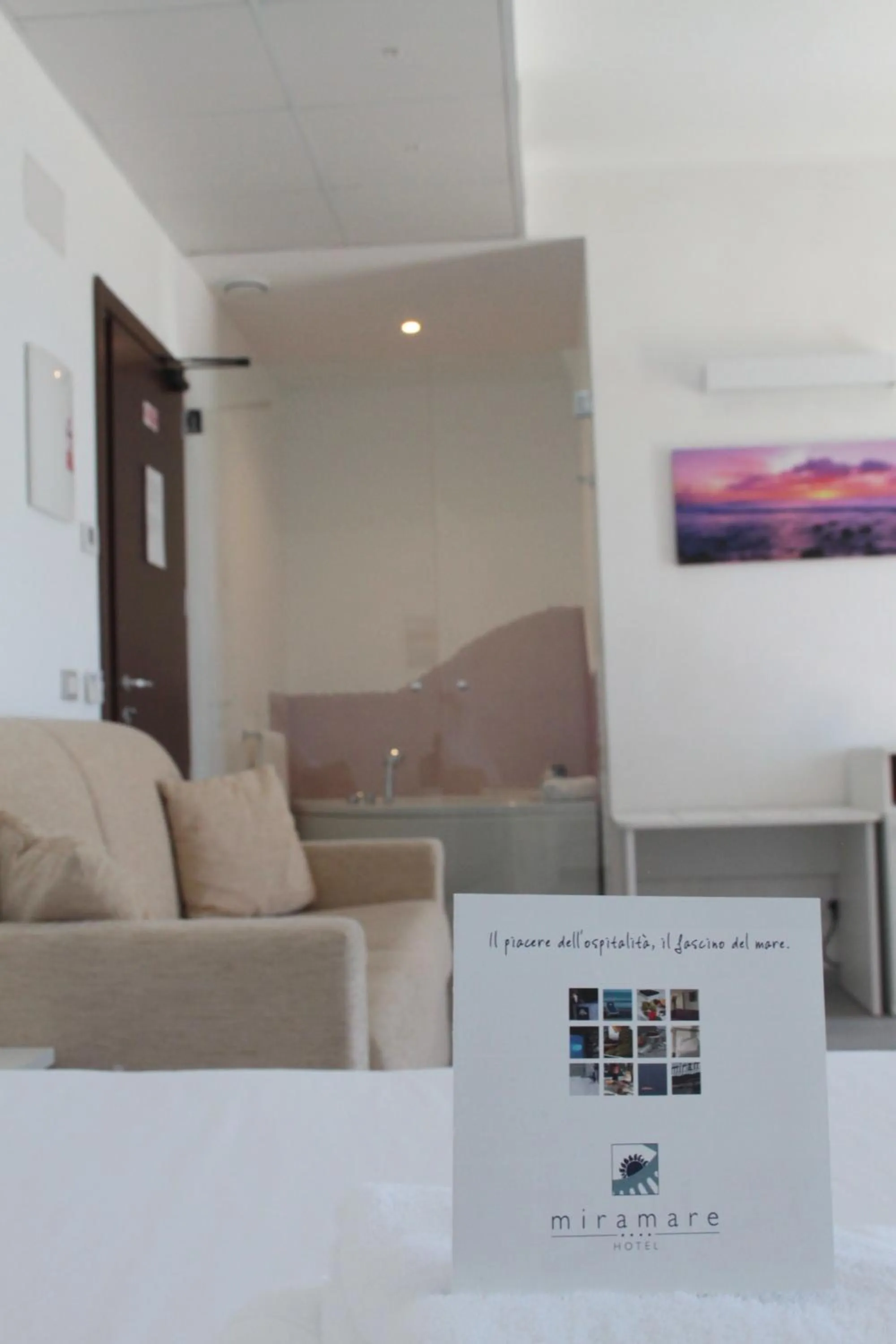 Property logo or sign in Hotel Miramare