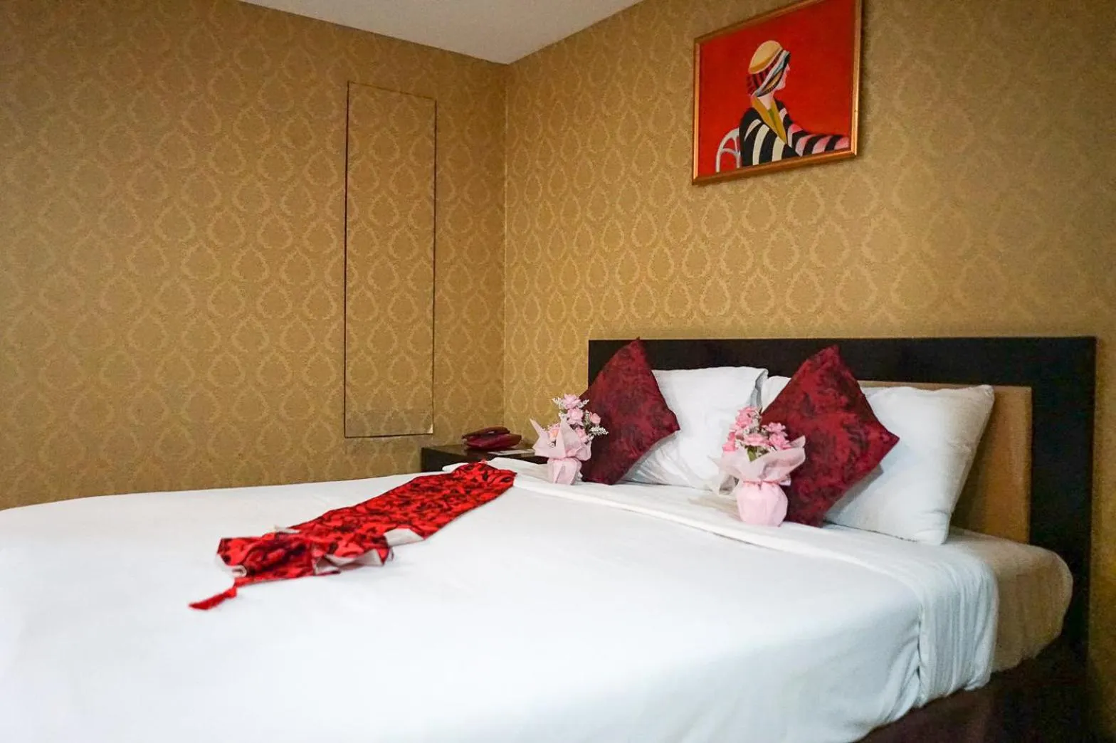 Bed in Grand Lucky Hotel