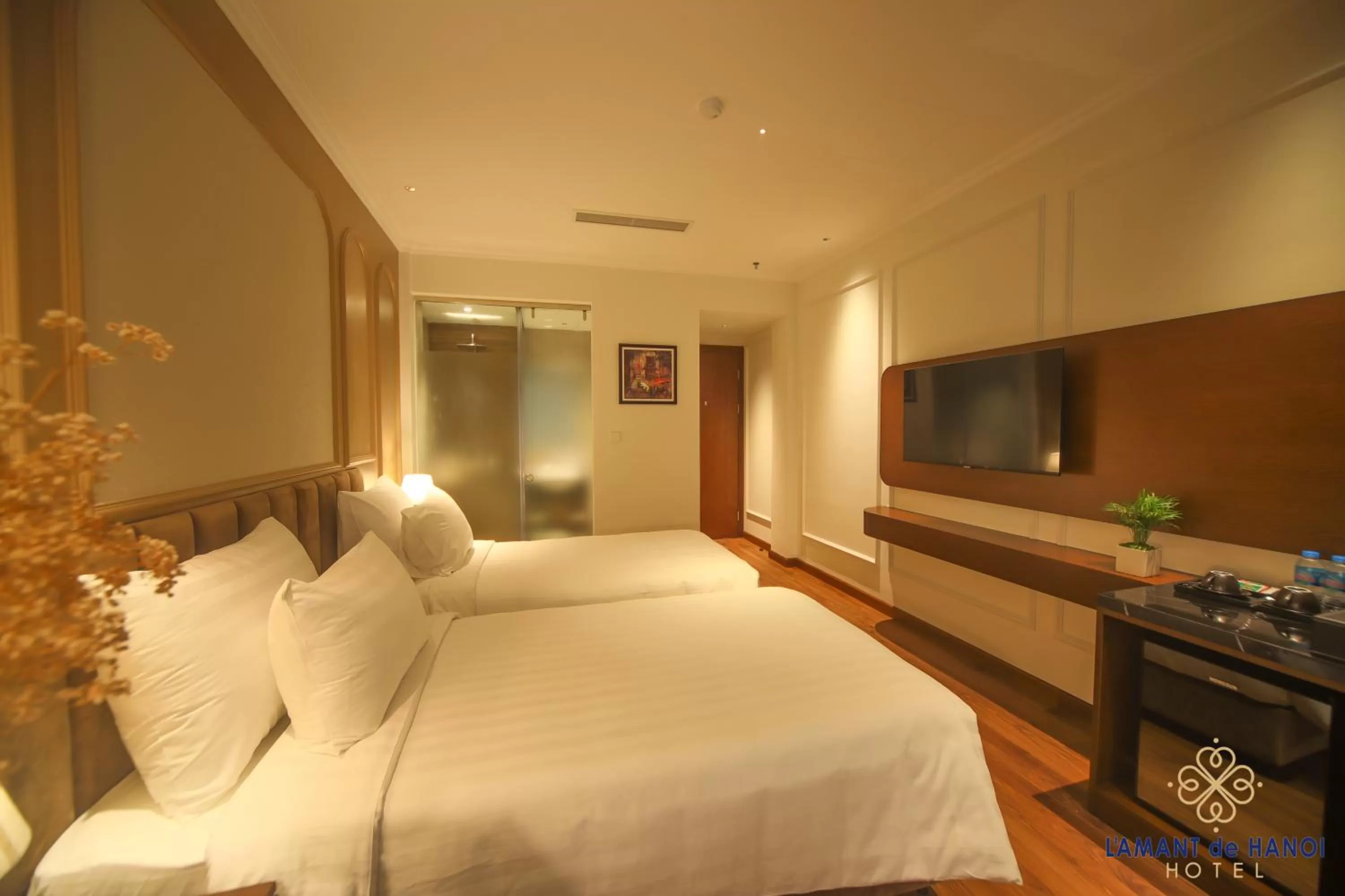 Bed in L'amant de Hanoi Hotel - khách sạn Lamant de Hà Nội