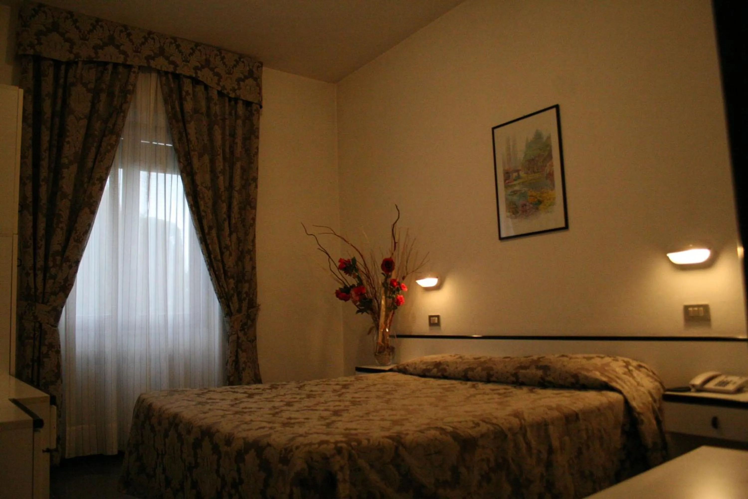 Bed in Hotel La Meridiana
