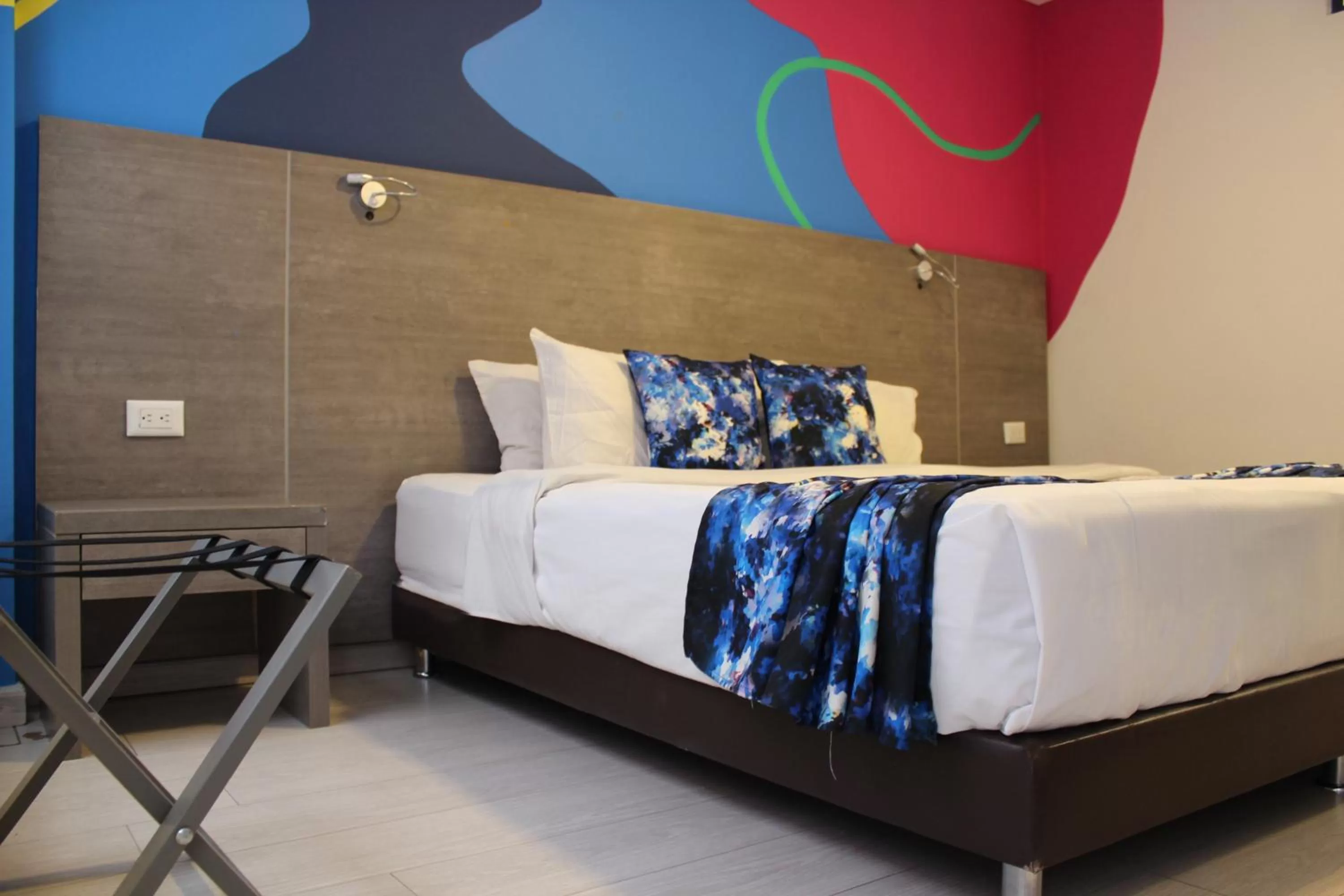 Bed in Agora Suites Self-Service Boutique Hotel