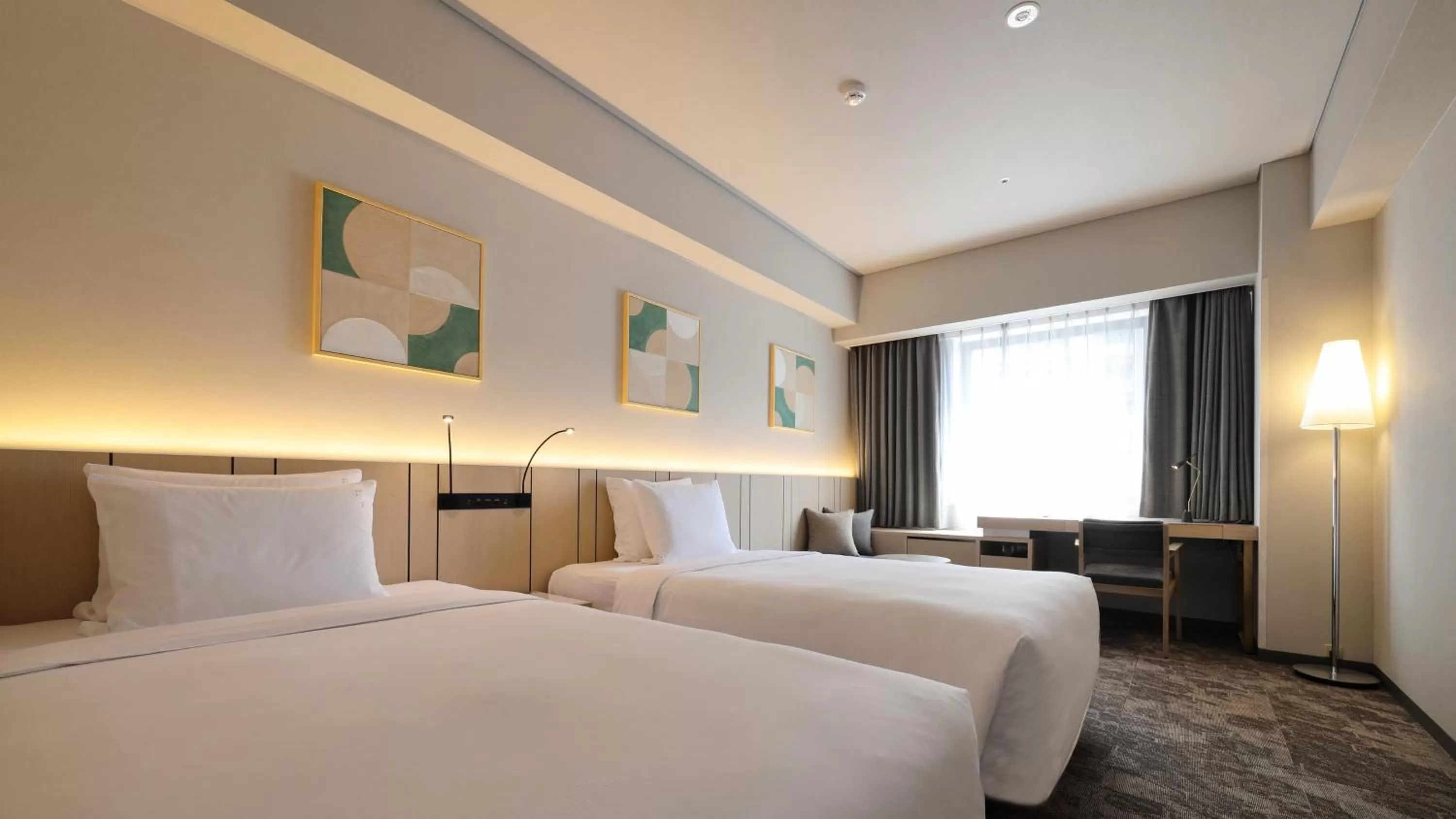 Bed in ANA Holiday Inn Sendai by IHG
