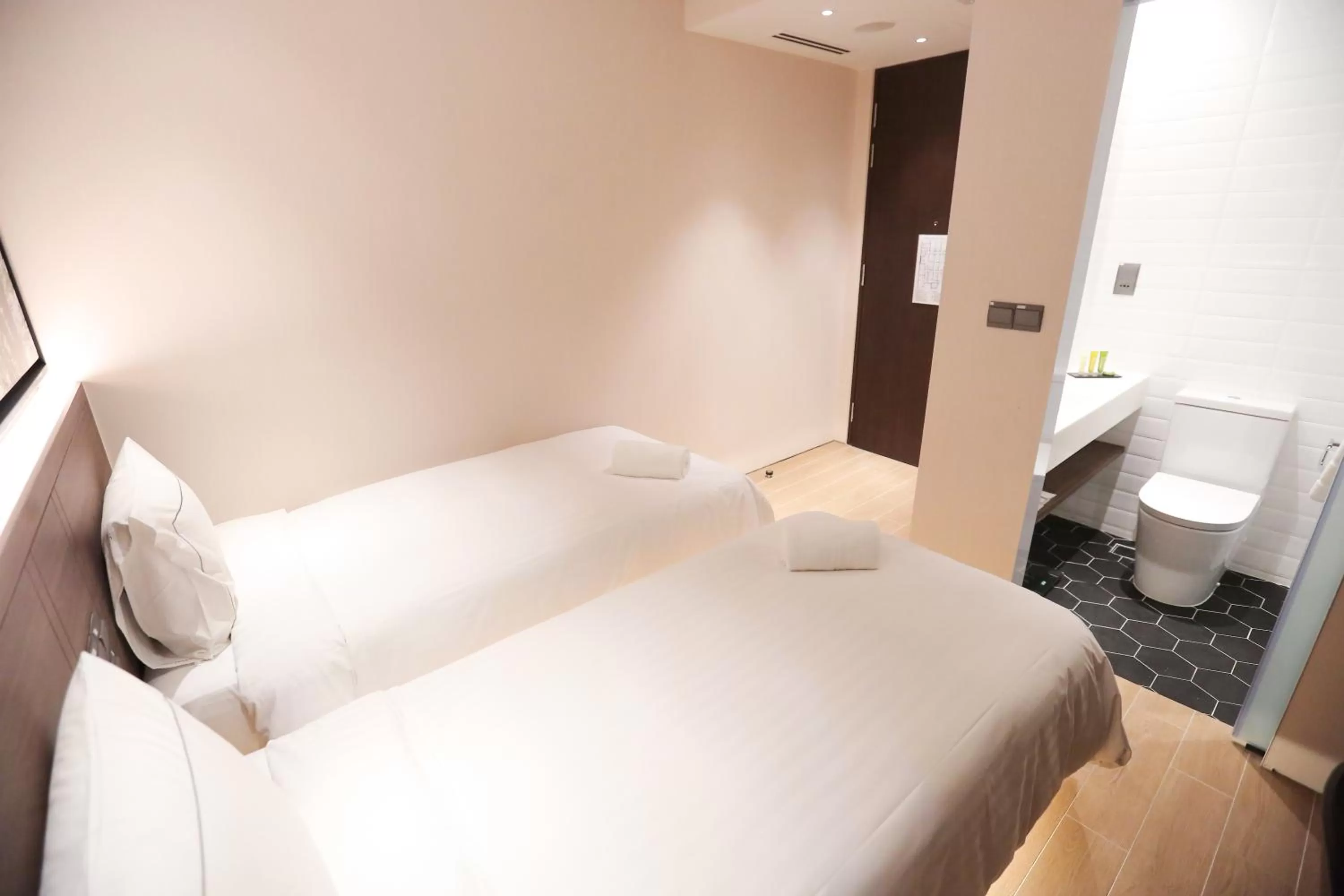 Bed in L Hotel Premier By Lion Peak