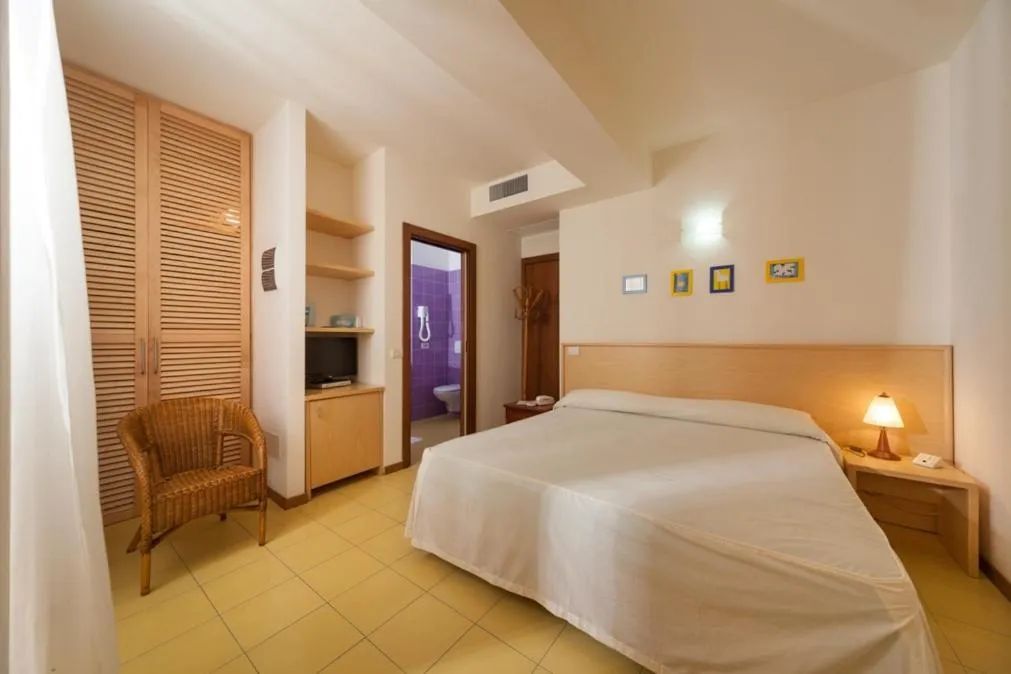 Bed in Hotel Resort Marinella