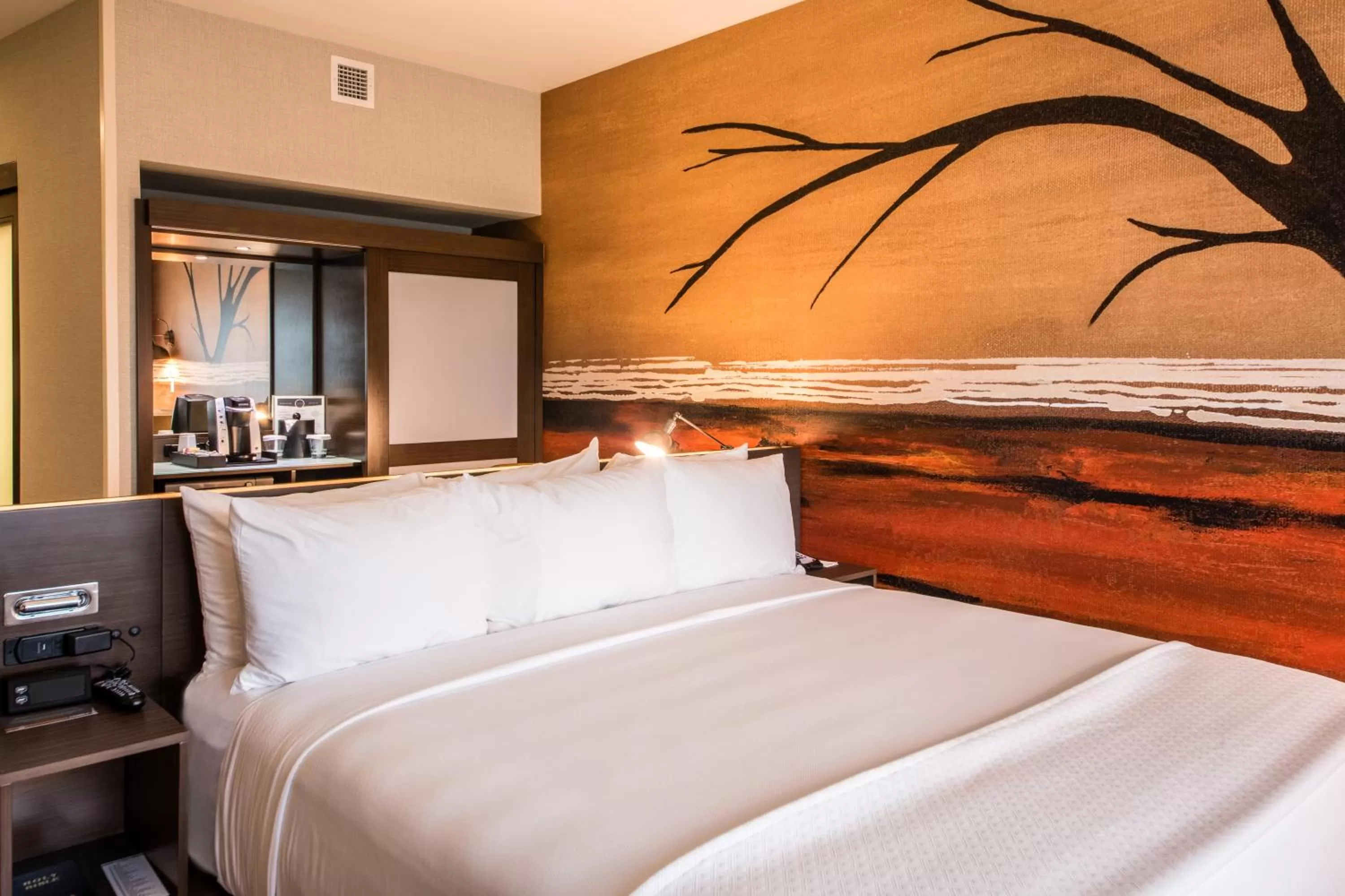 Bed in Cambria Hotel McAllen Convention Center