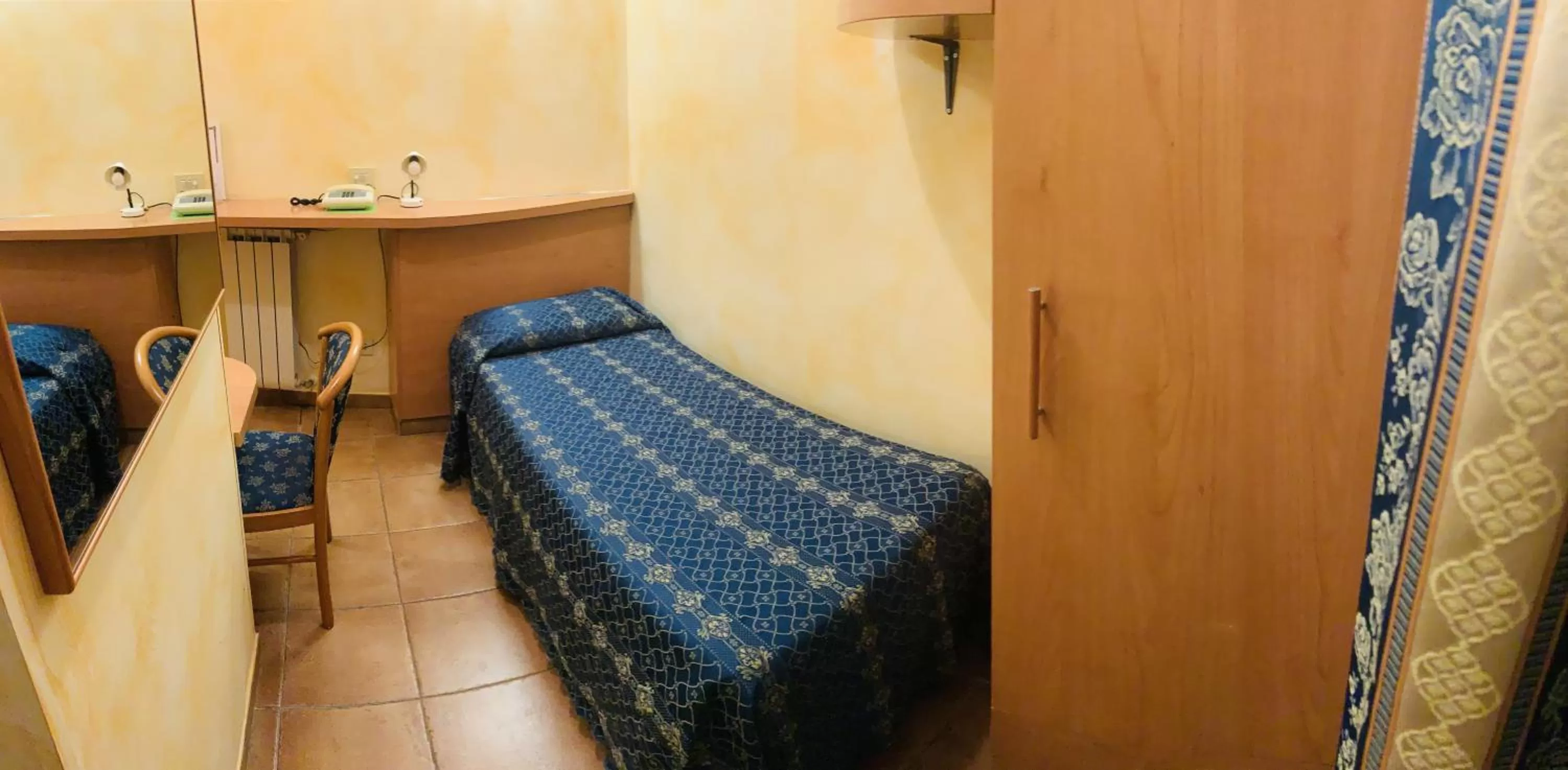 Bed in Hotel Miramare