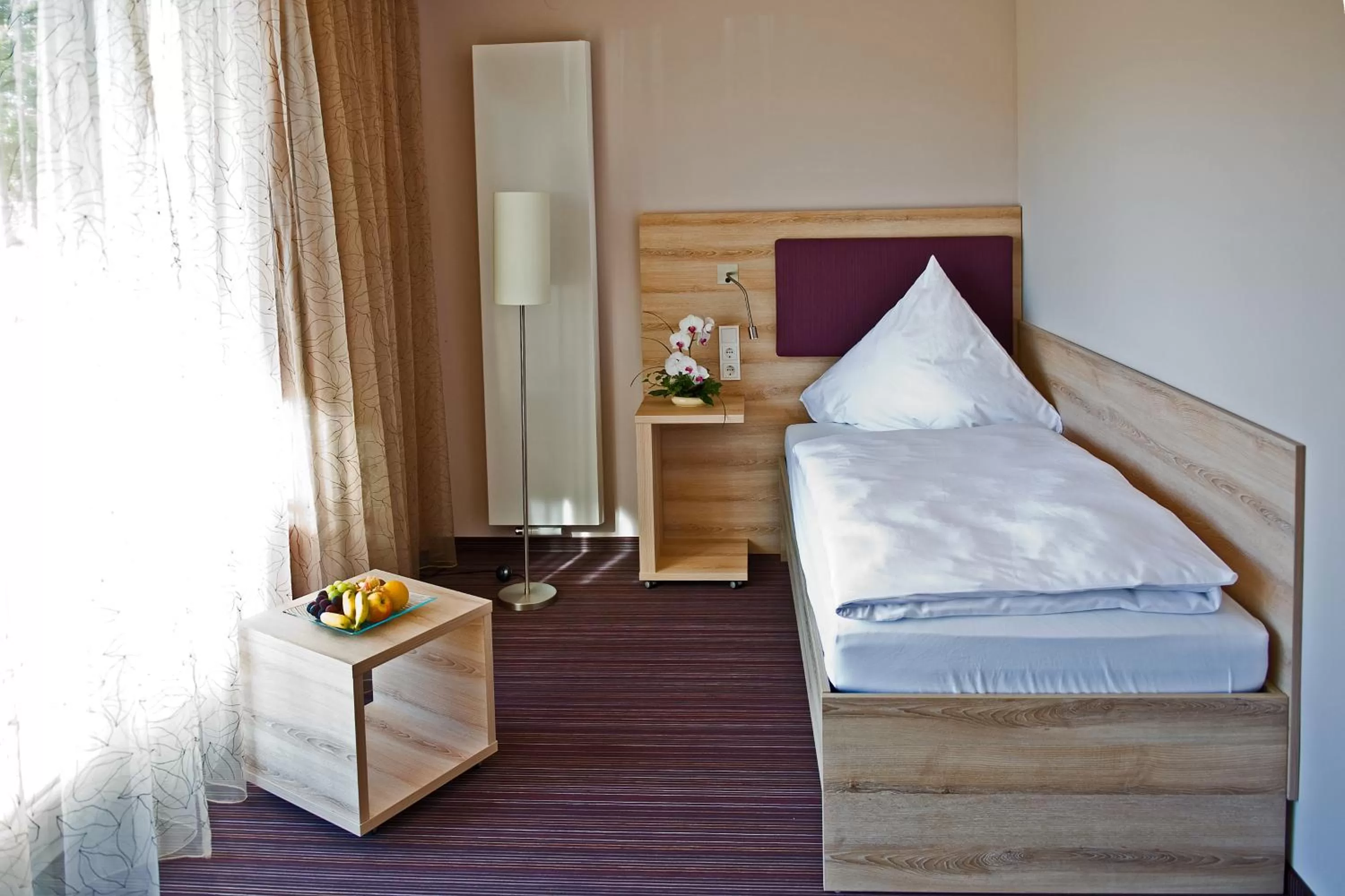 Bed in Stössels Hotel