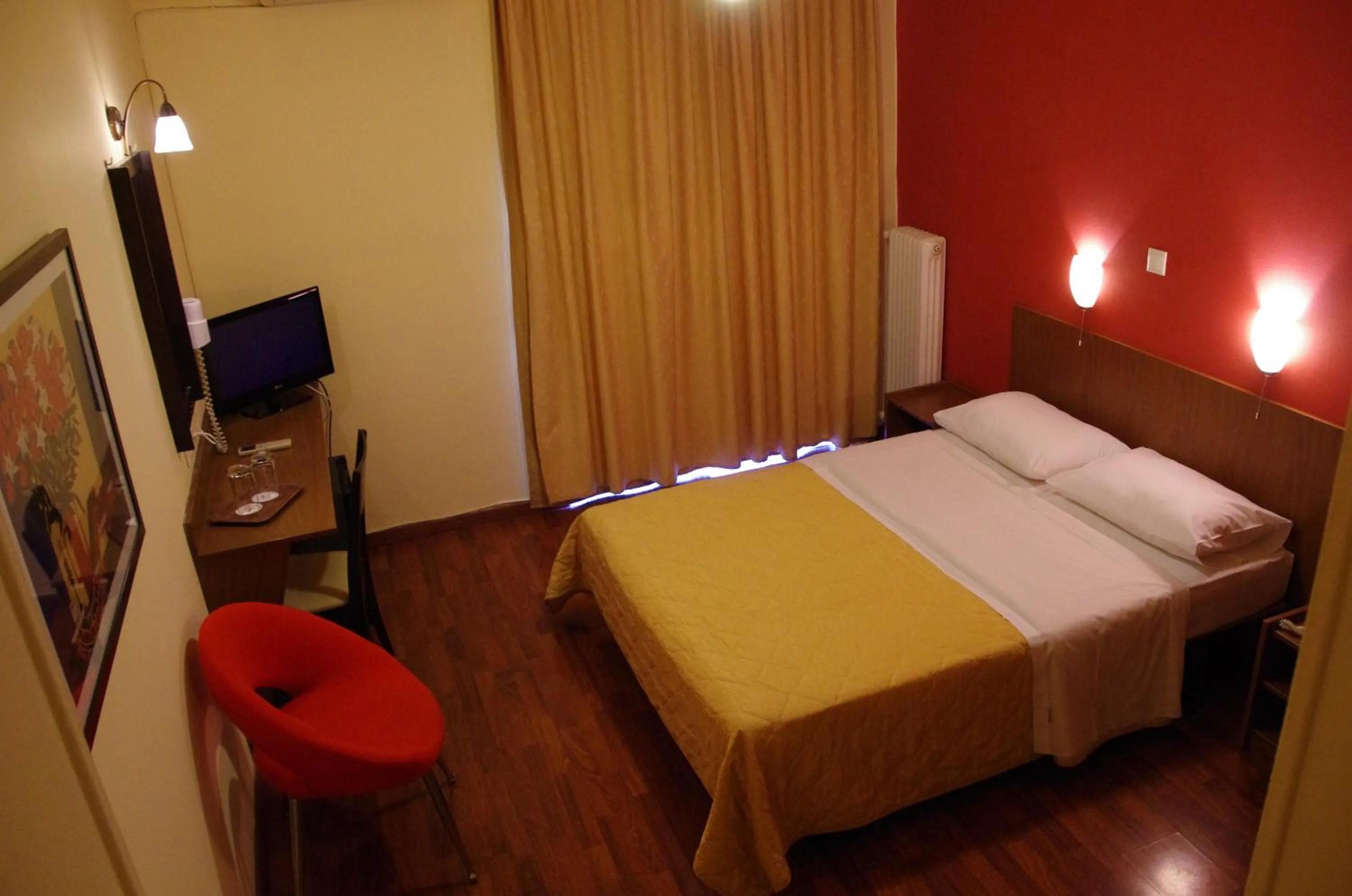 Bed in Hotel Exarchion