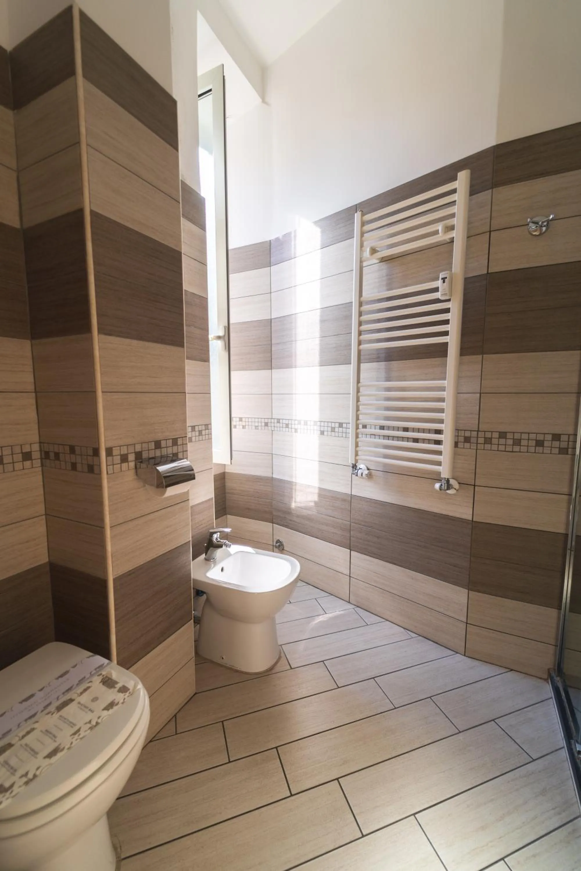 Toilet in Rome Central Rooms