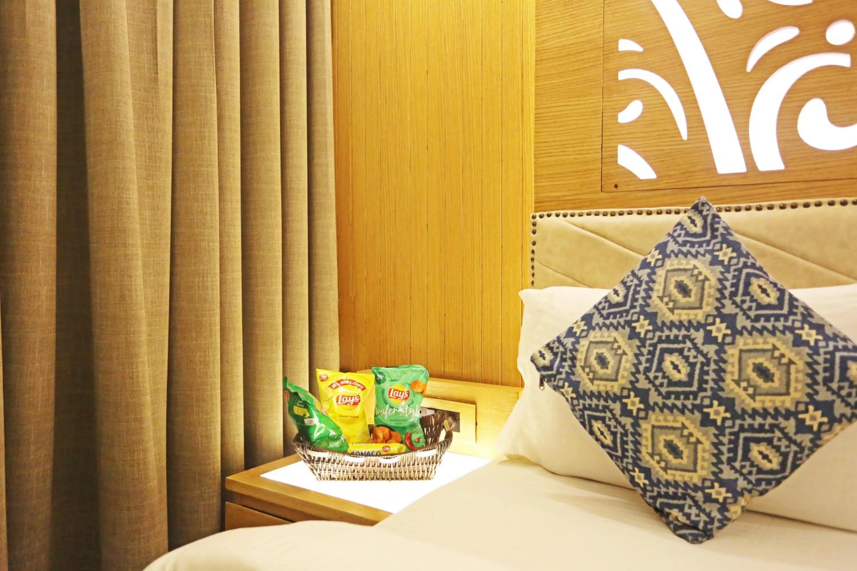 Bed in JRD Luxury-Business Hotel