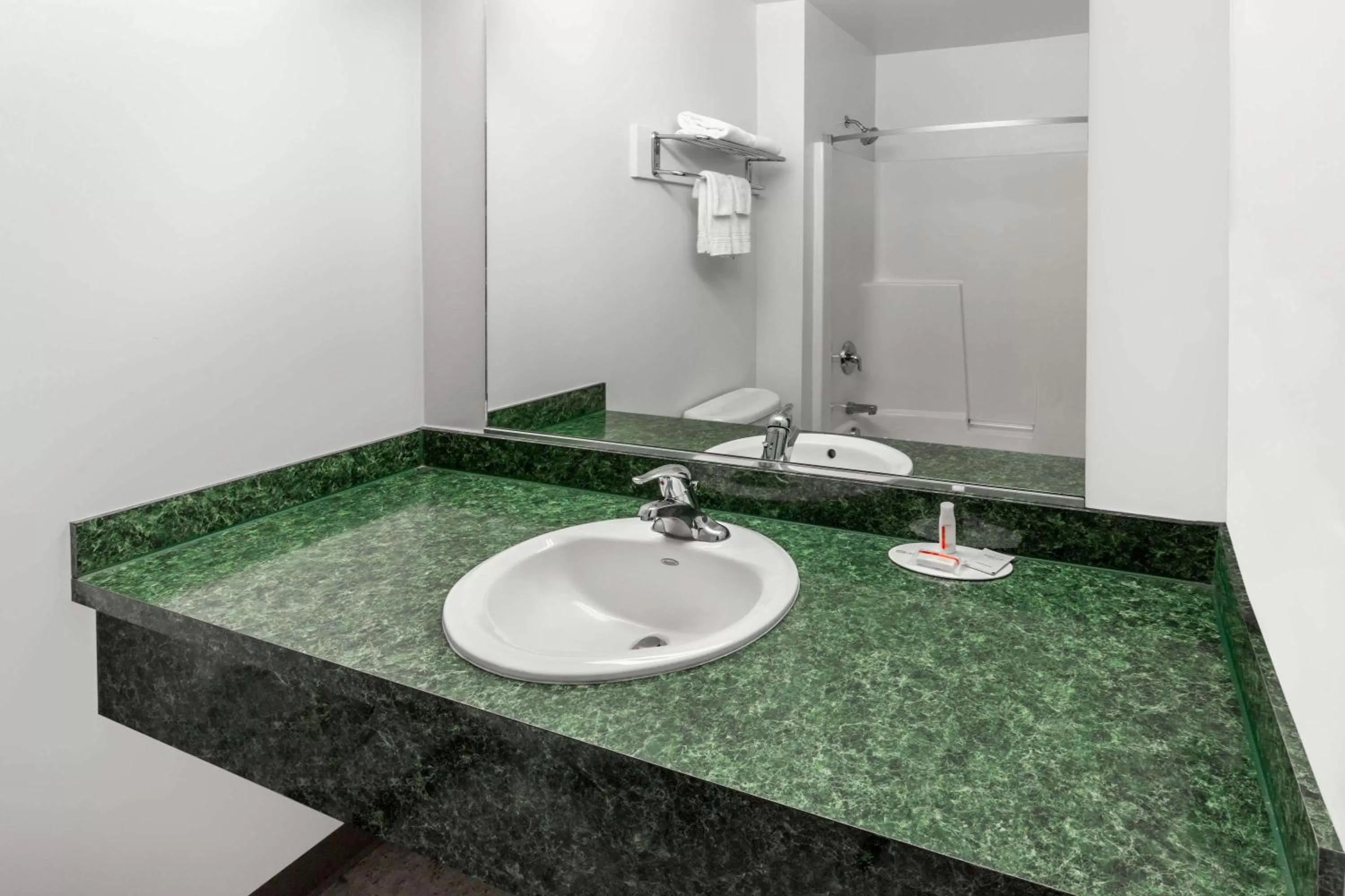 Bathroom in Super 8 by Wyndham Central Pt Medford