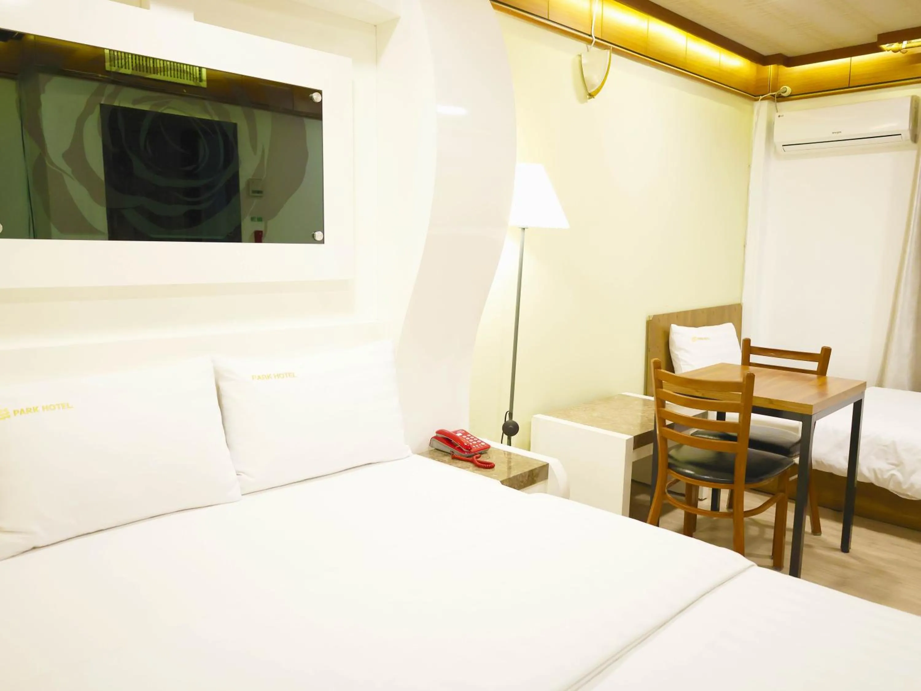 Bed in Goodstay Andong Park Hotel