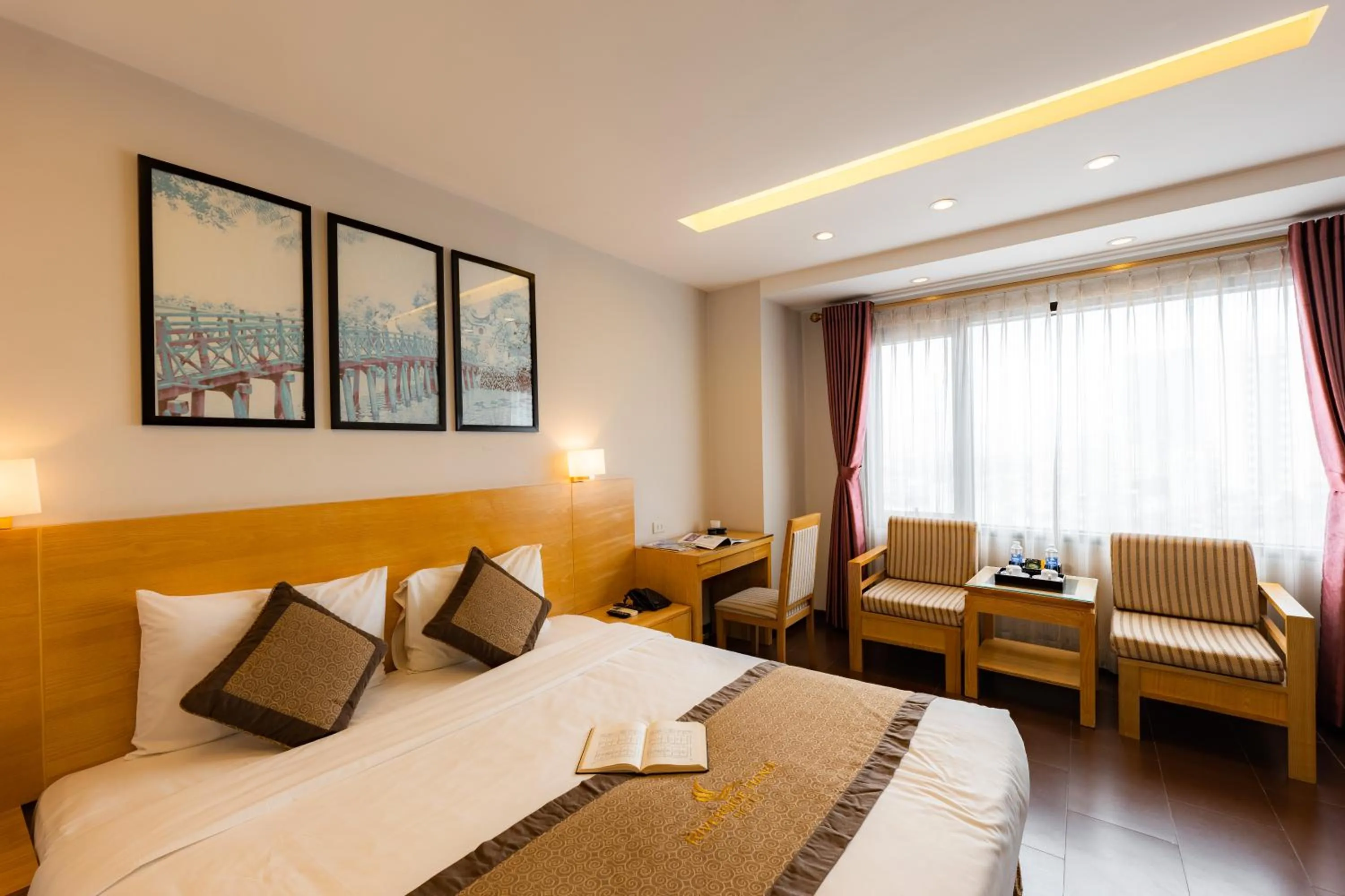 Bed in Riverside Hanoi Hotel