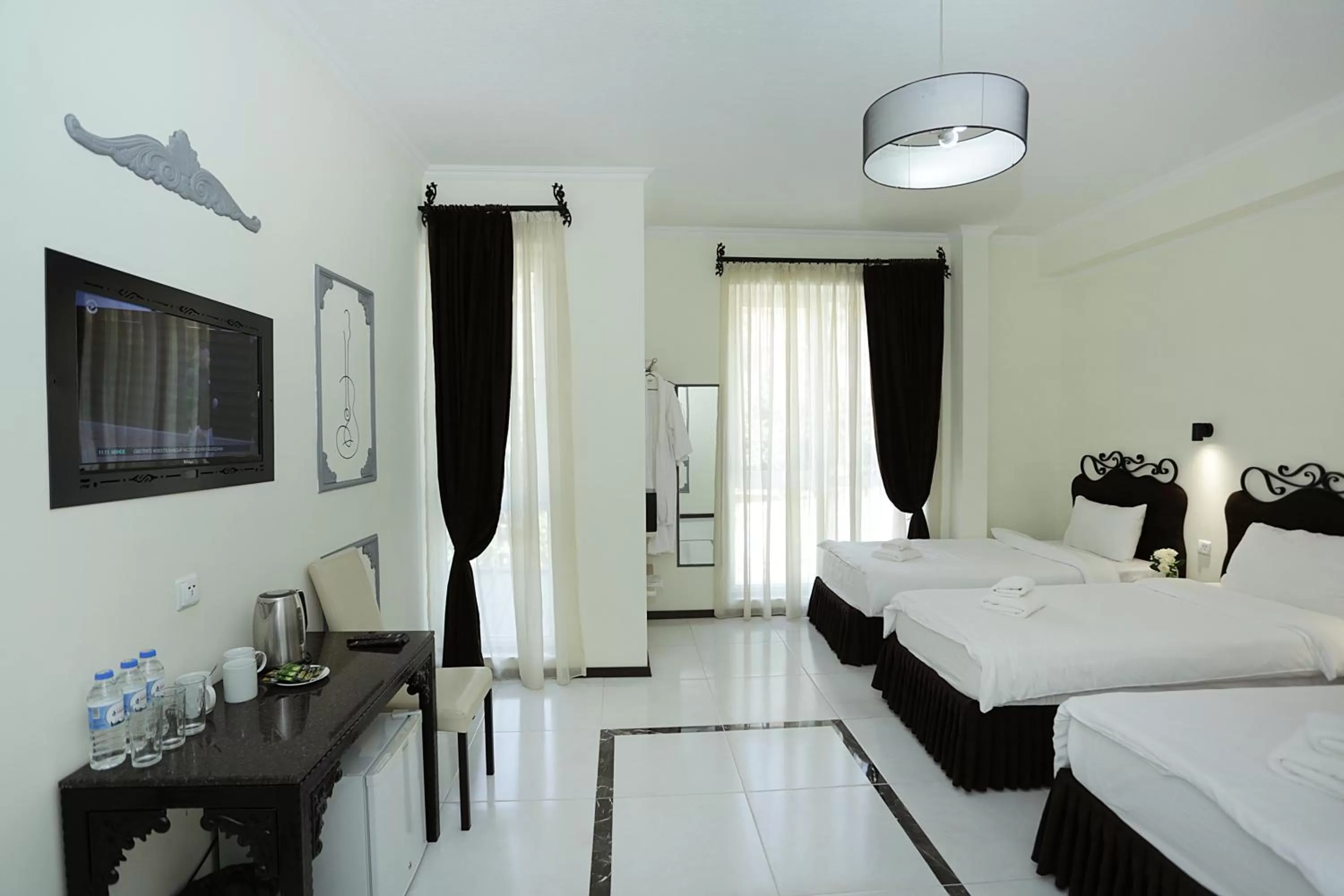 Photo of the whole room, Bed in The One Boutique