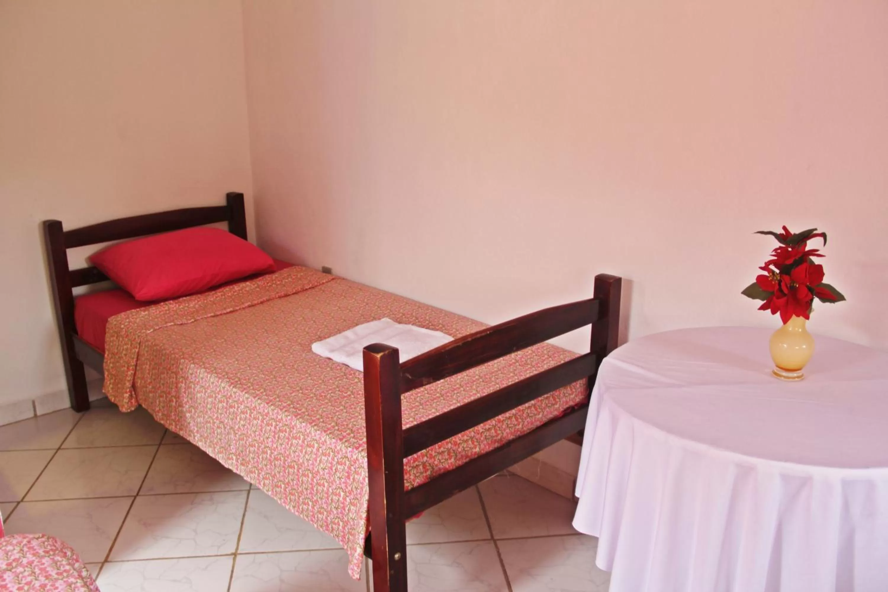 Bed in Pousada da Rose Paraty