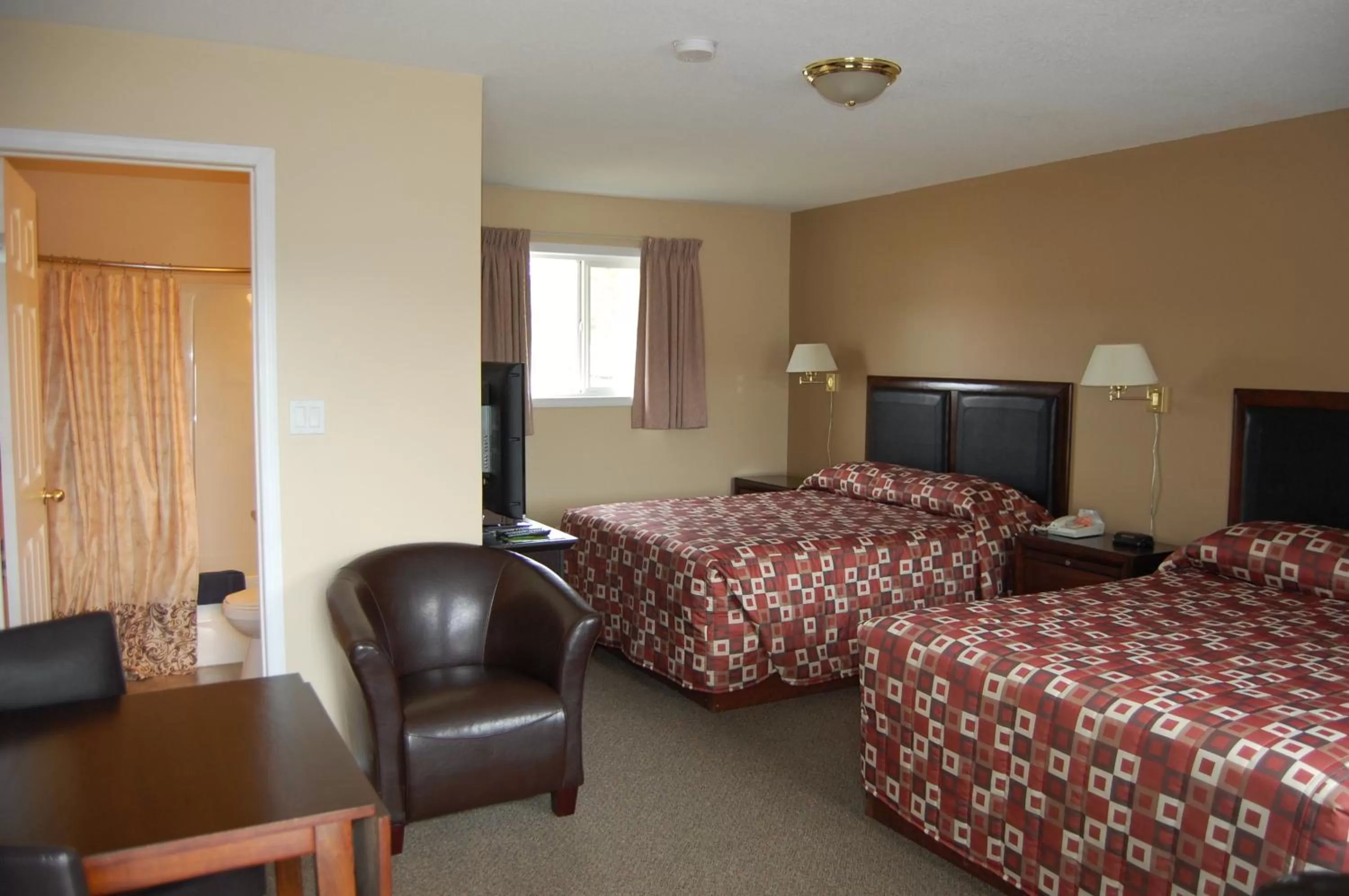 Bed in Monte Carlo Motel