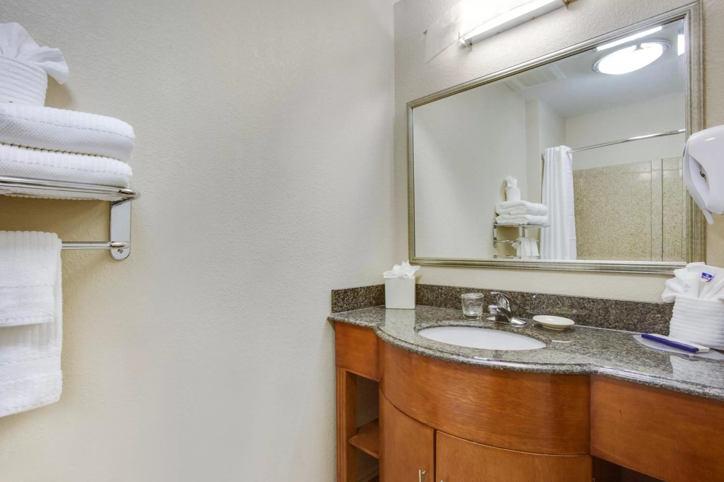 Bathroom in Candlewood Suites Virginia Beach Town Center by IHG