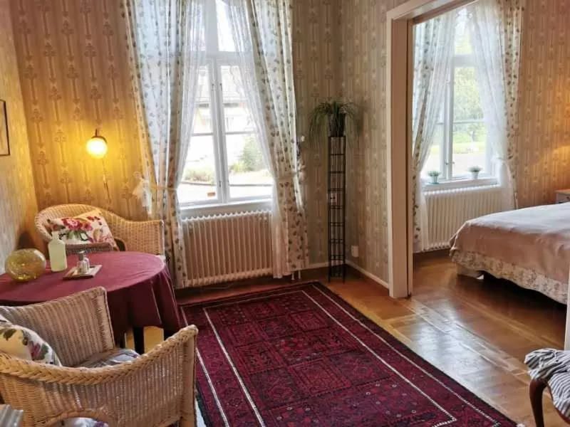 Living room, Bed in Ulfshyttans Herrgård, nära Romme Alpin