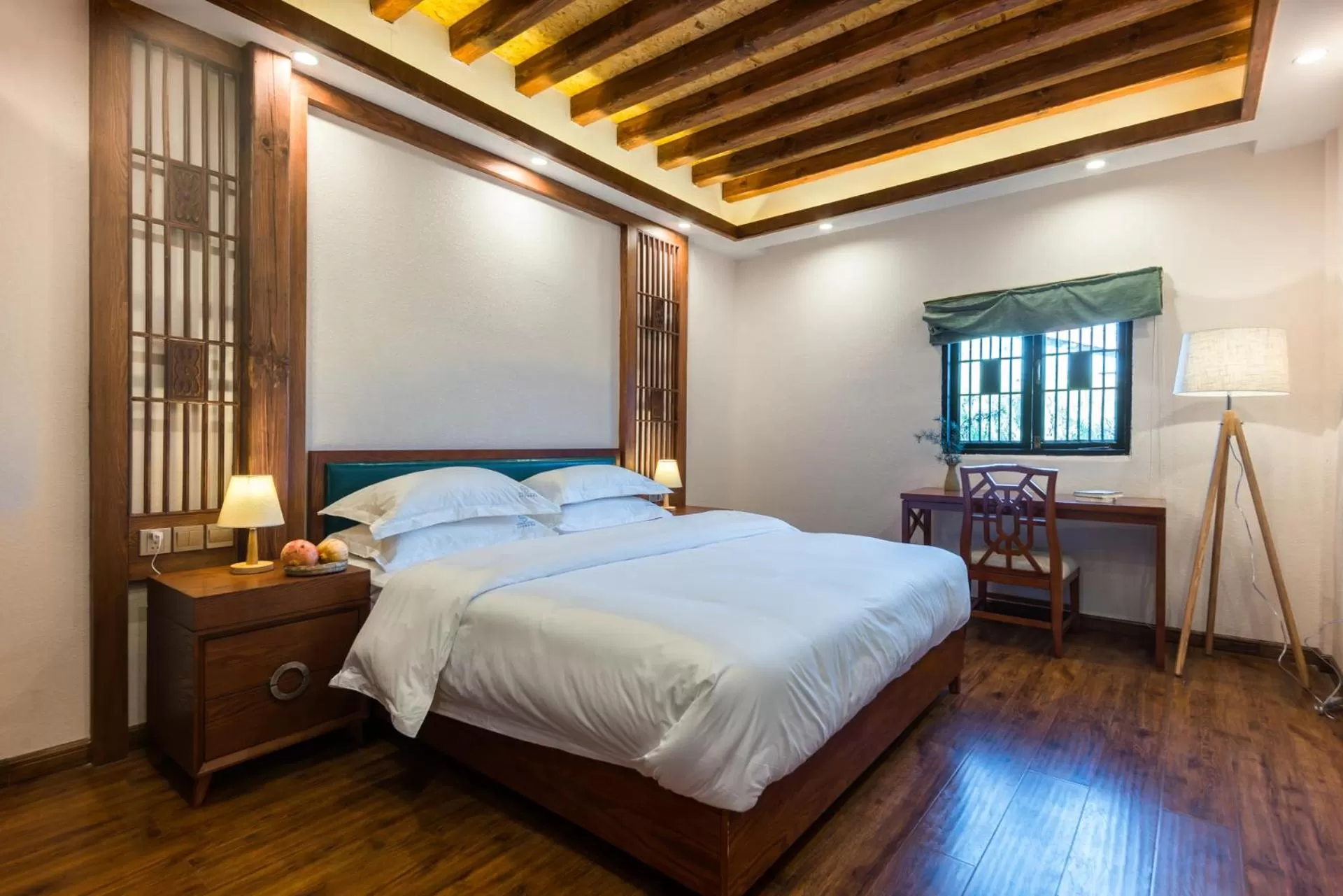 Bed in Lijiang Gemmer Hotel