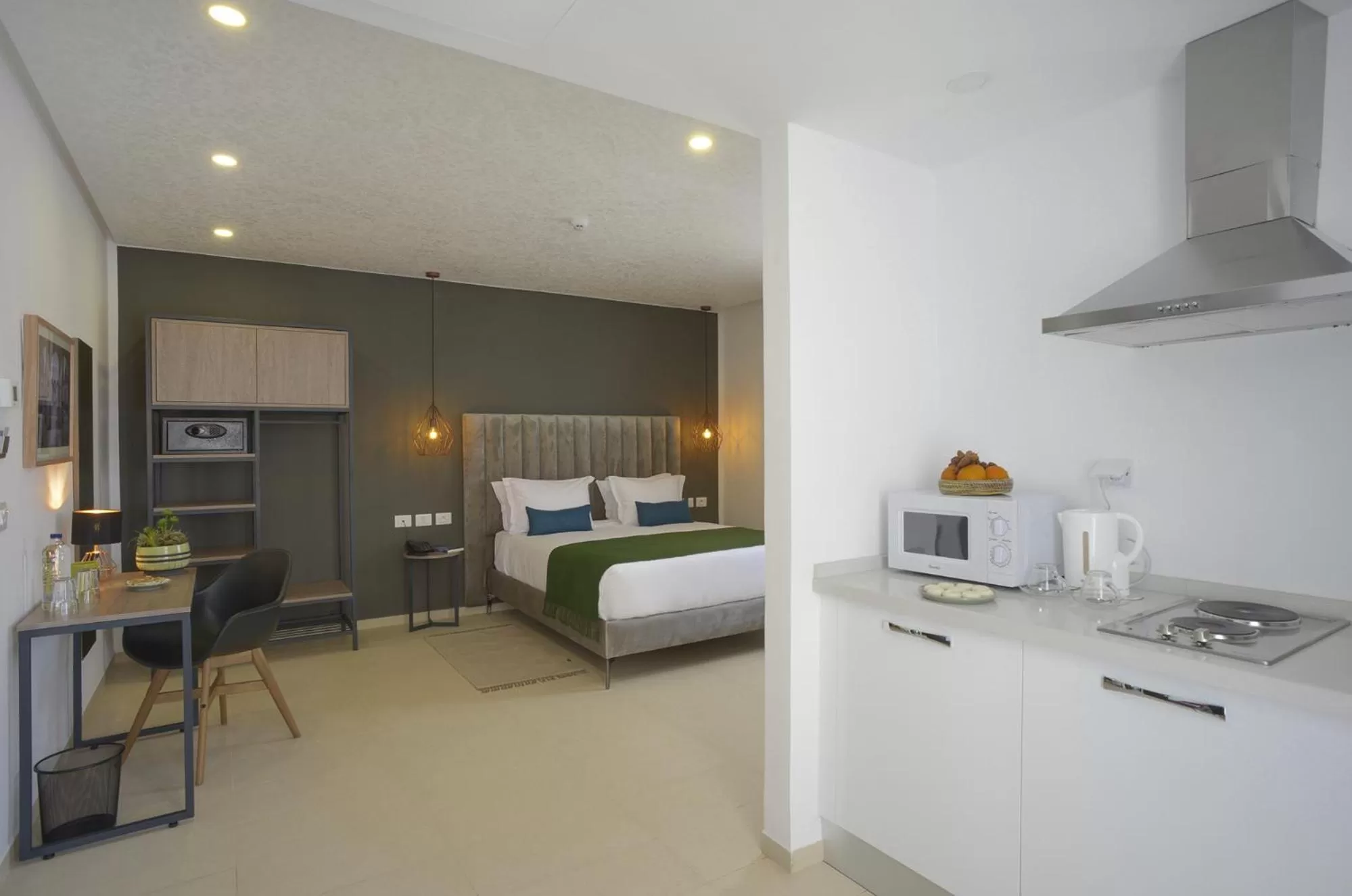 Kitchen or kitchenette, Bed in MAIA HOTEL SUITES