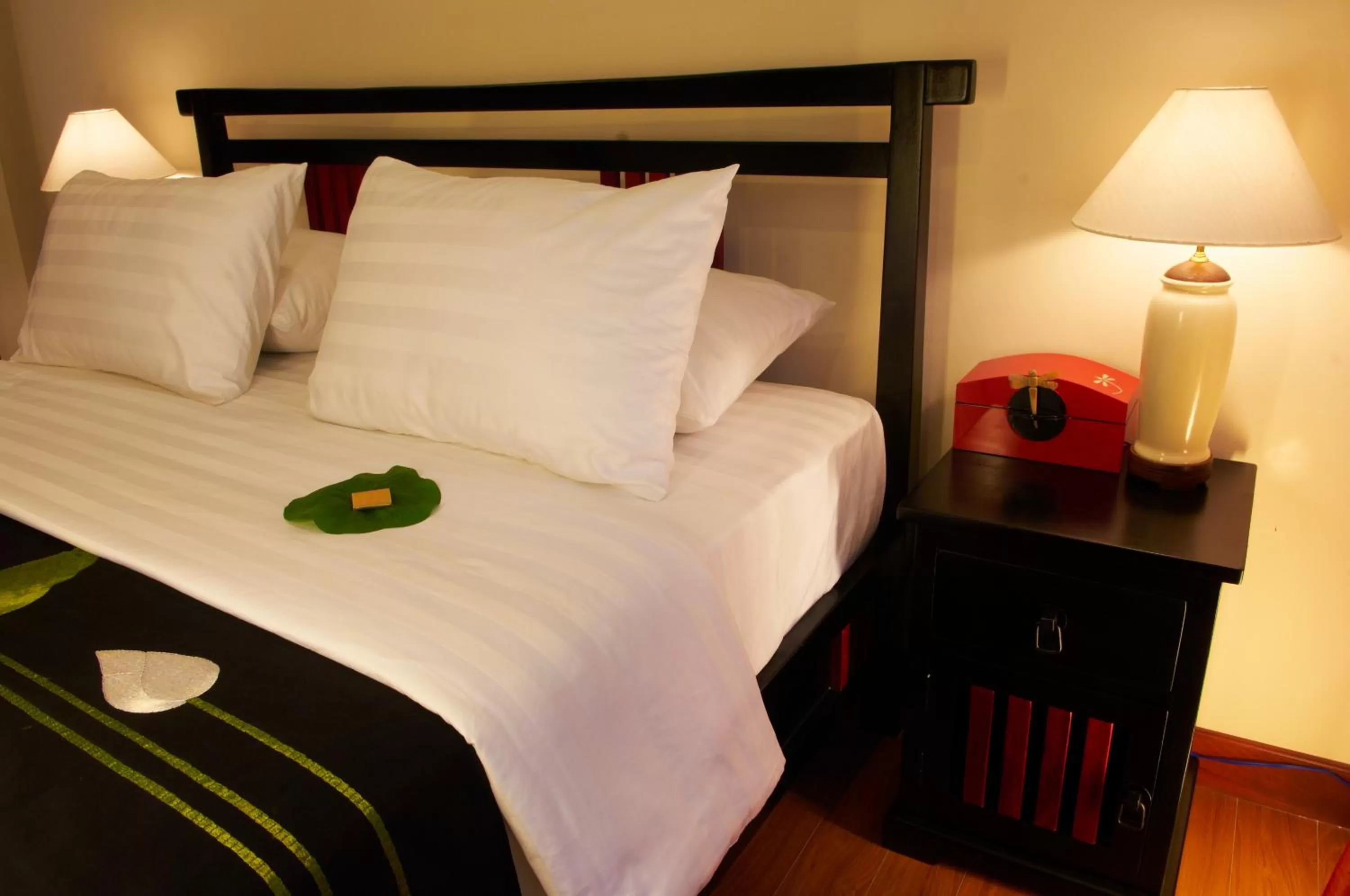 Bed in Nam Bo Boutique Hotel