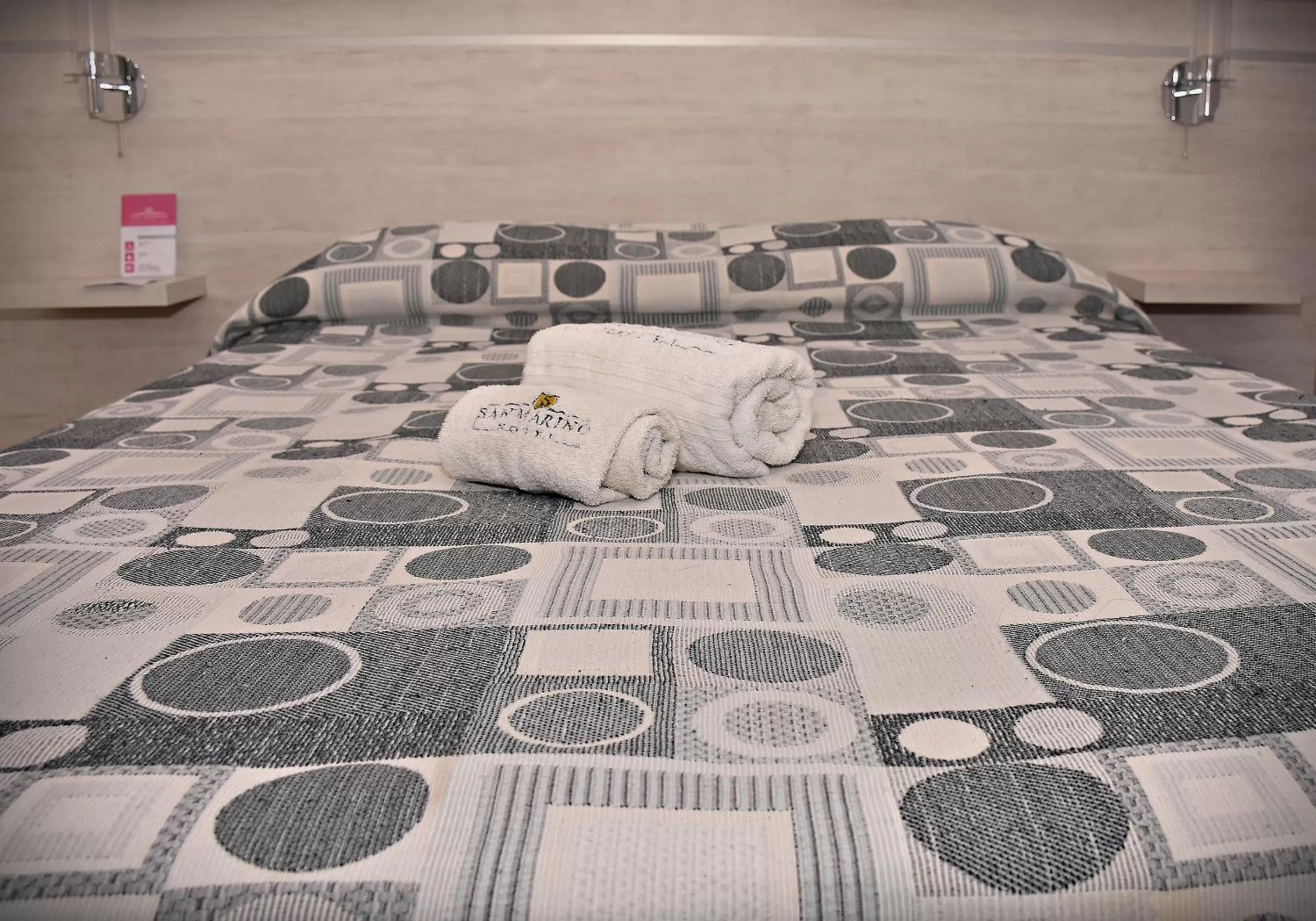 Bed in Hotel San Marino