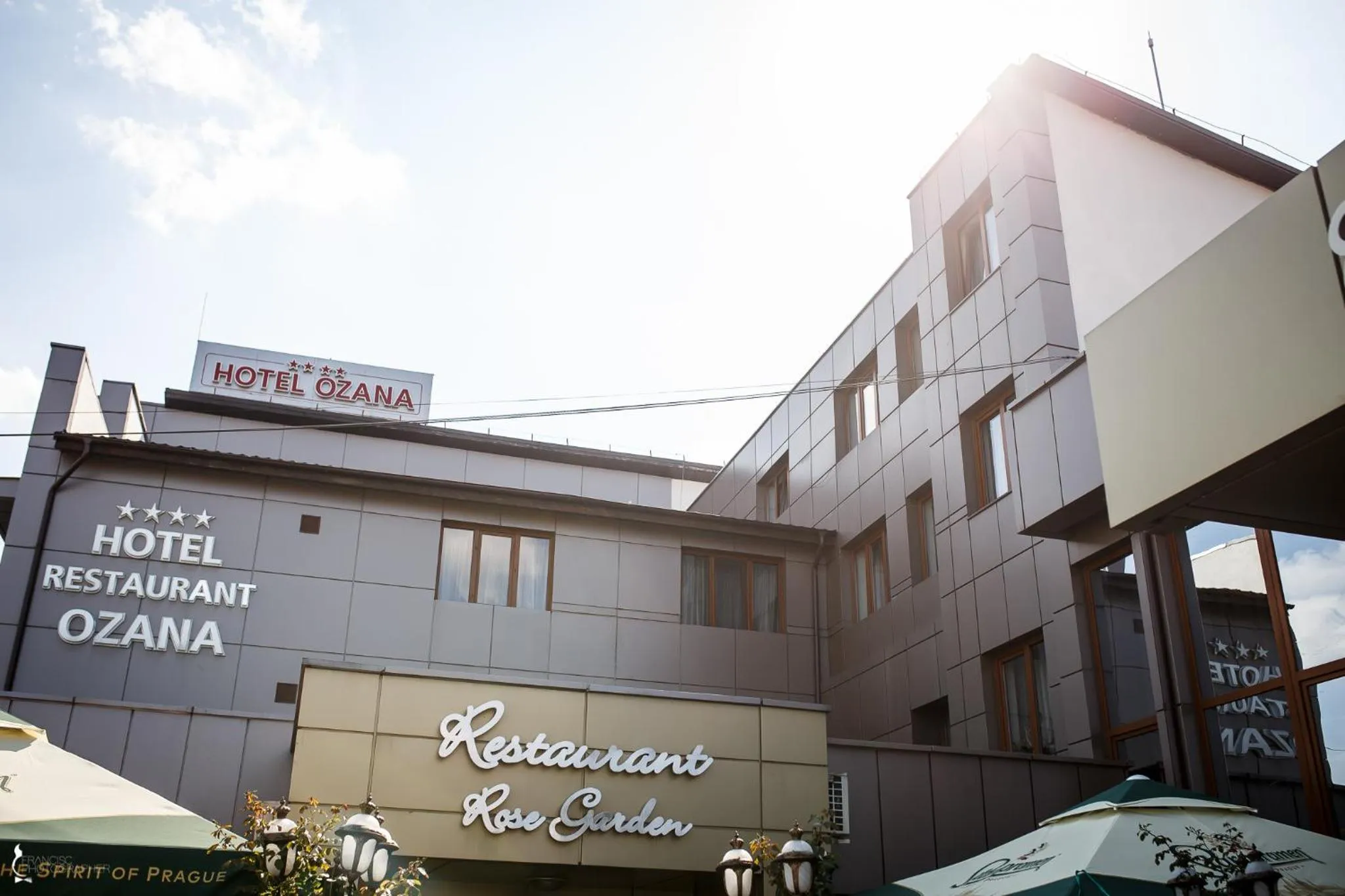 Property logo or sign in Hotel Ozana