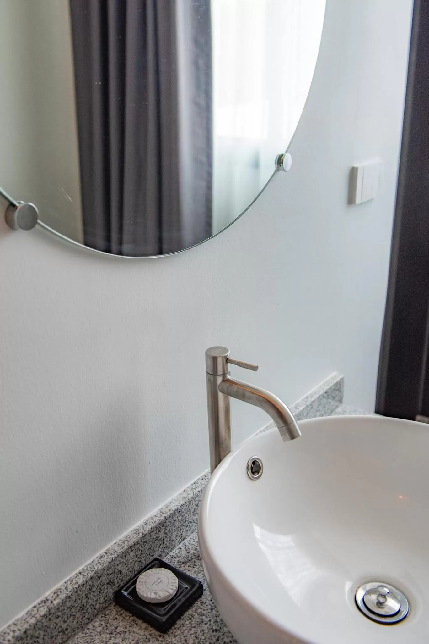 Bathroom in Luck Thai Hotel