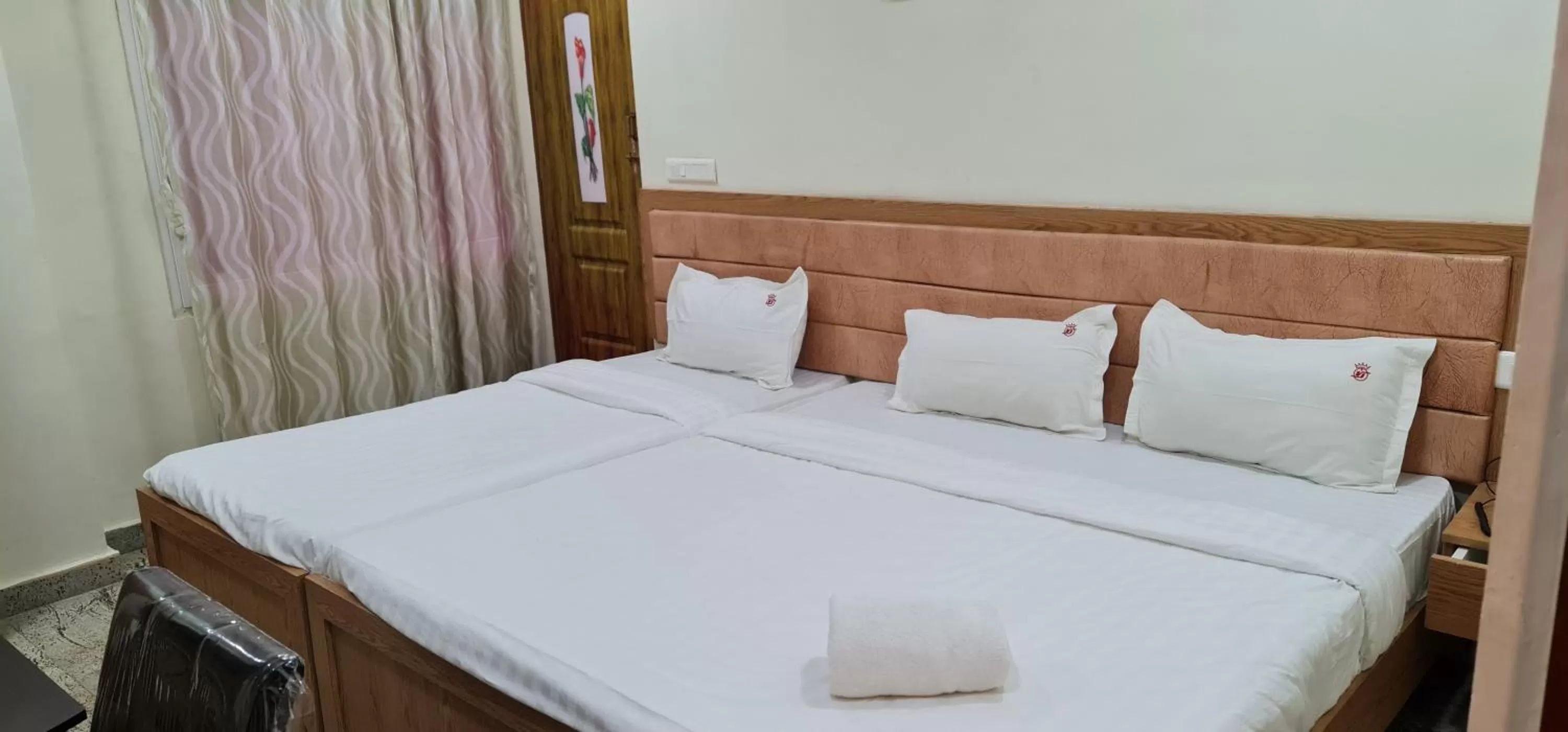 Bed in Vijay Shree Inn
