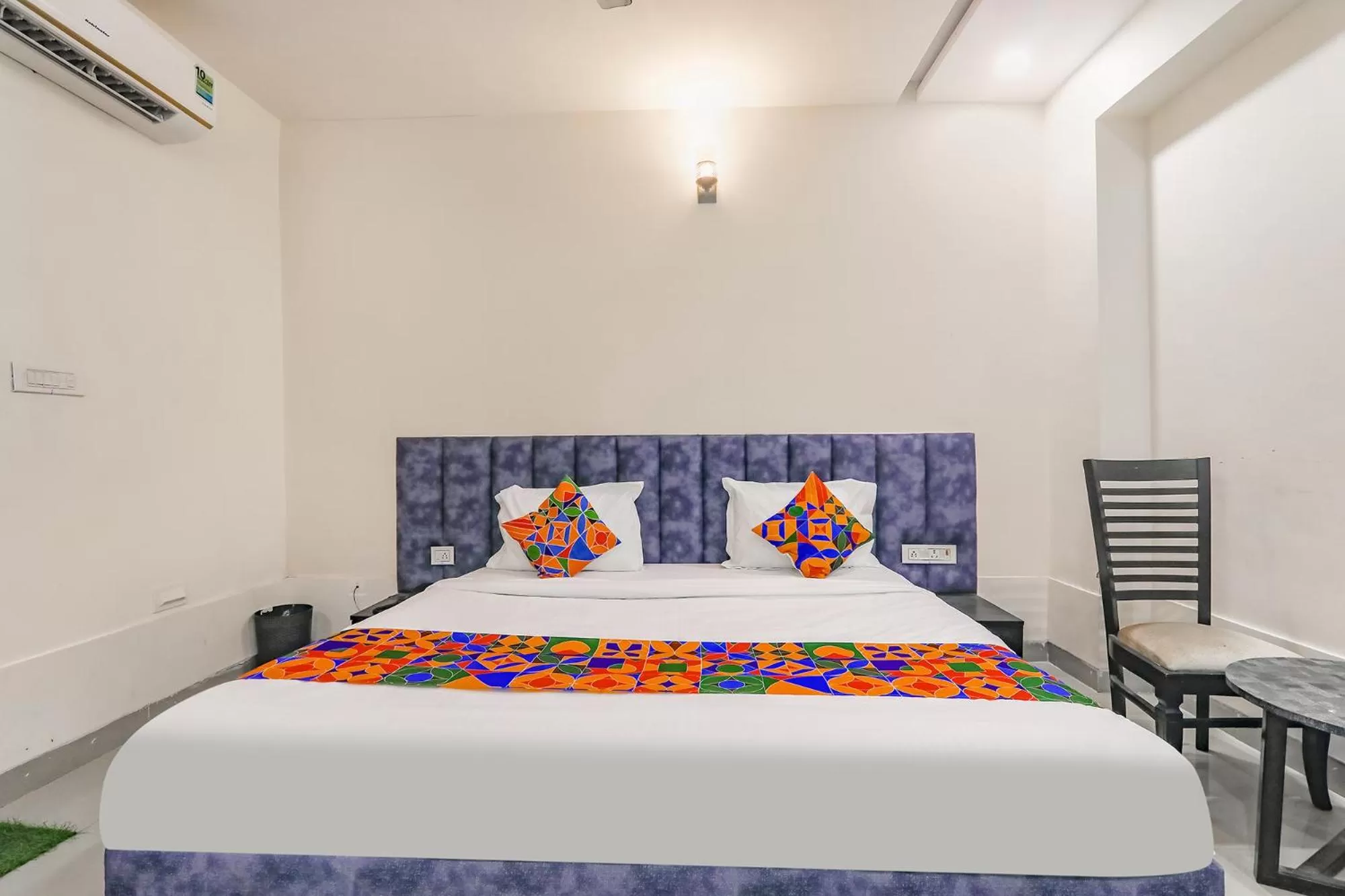 Bed in FabHotel Silver Stone Inn