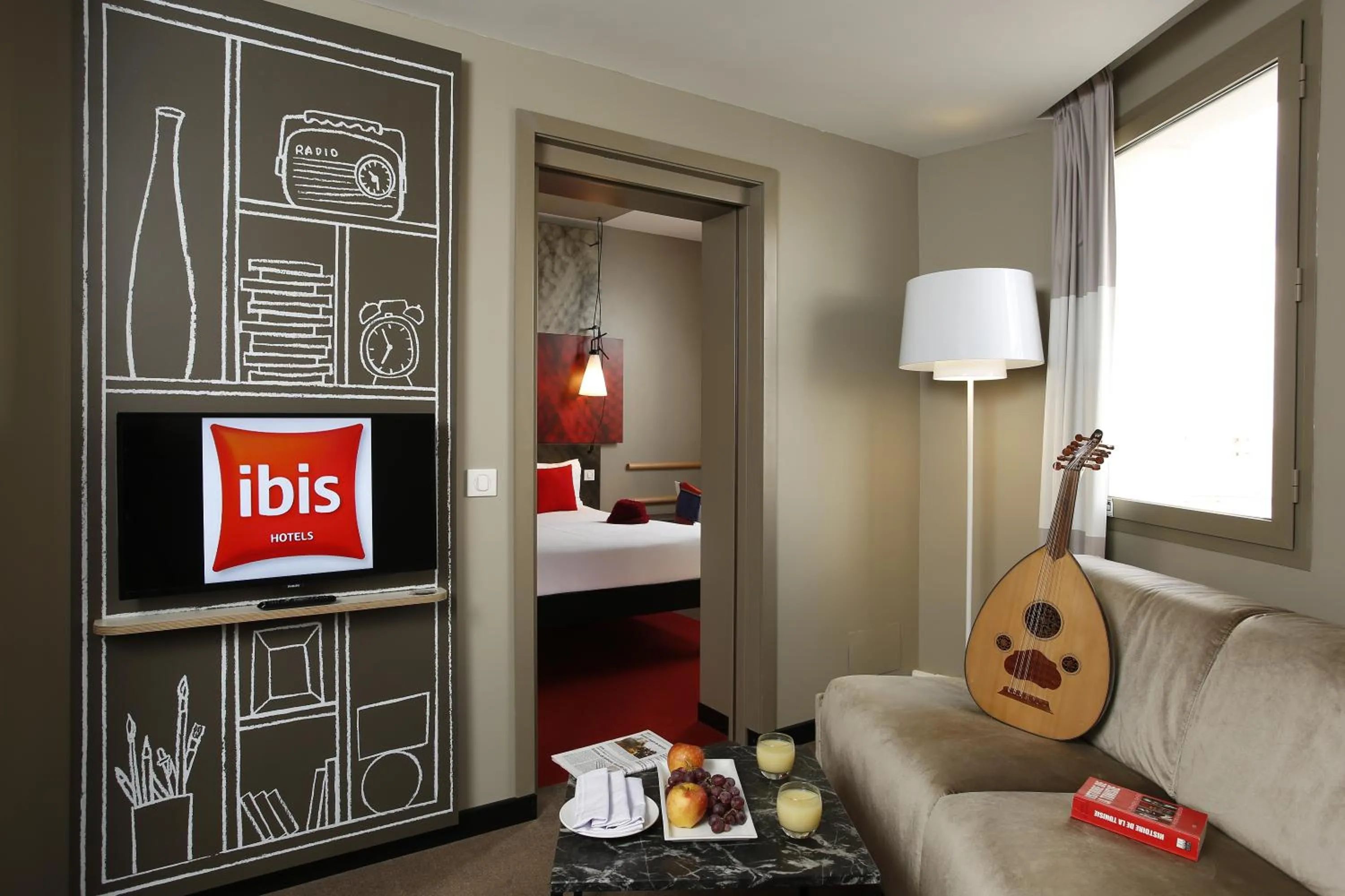Seating area, Bed in Ibis Sfax