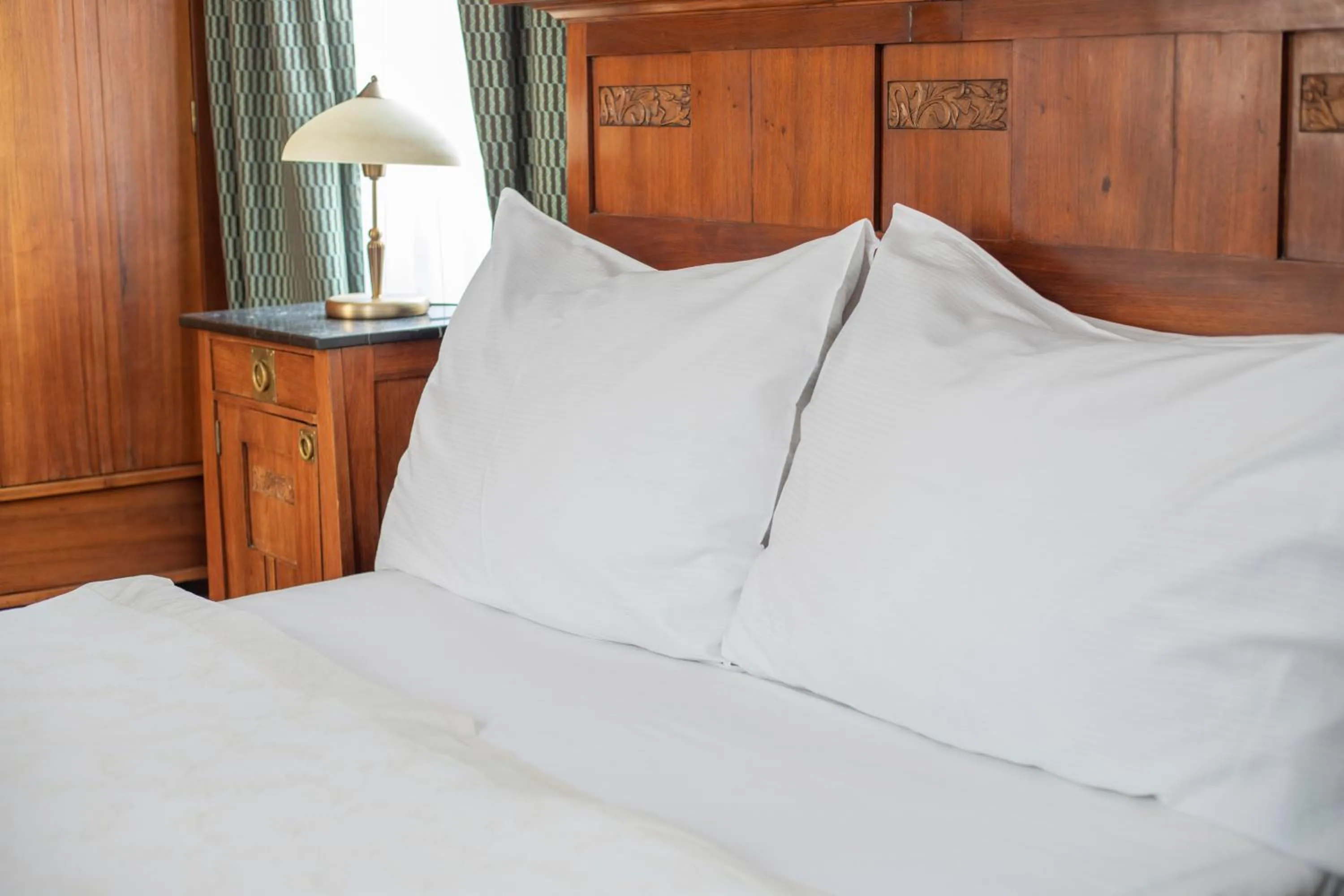 Bed in Hotel At the Green Grape