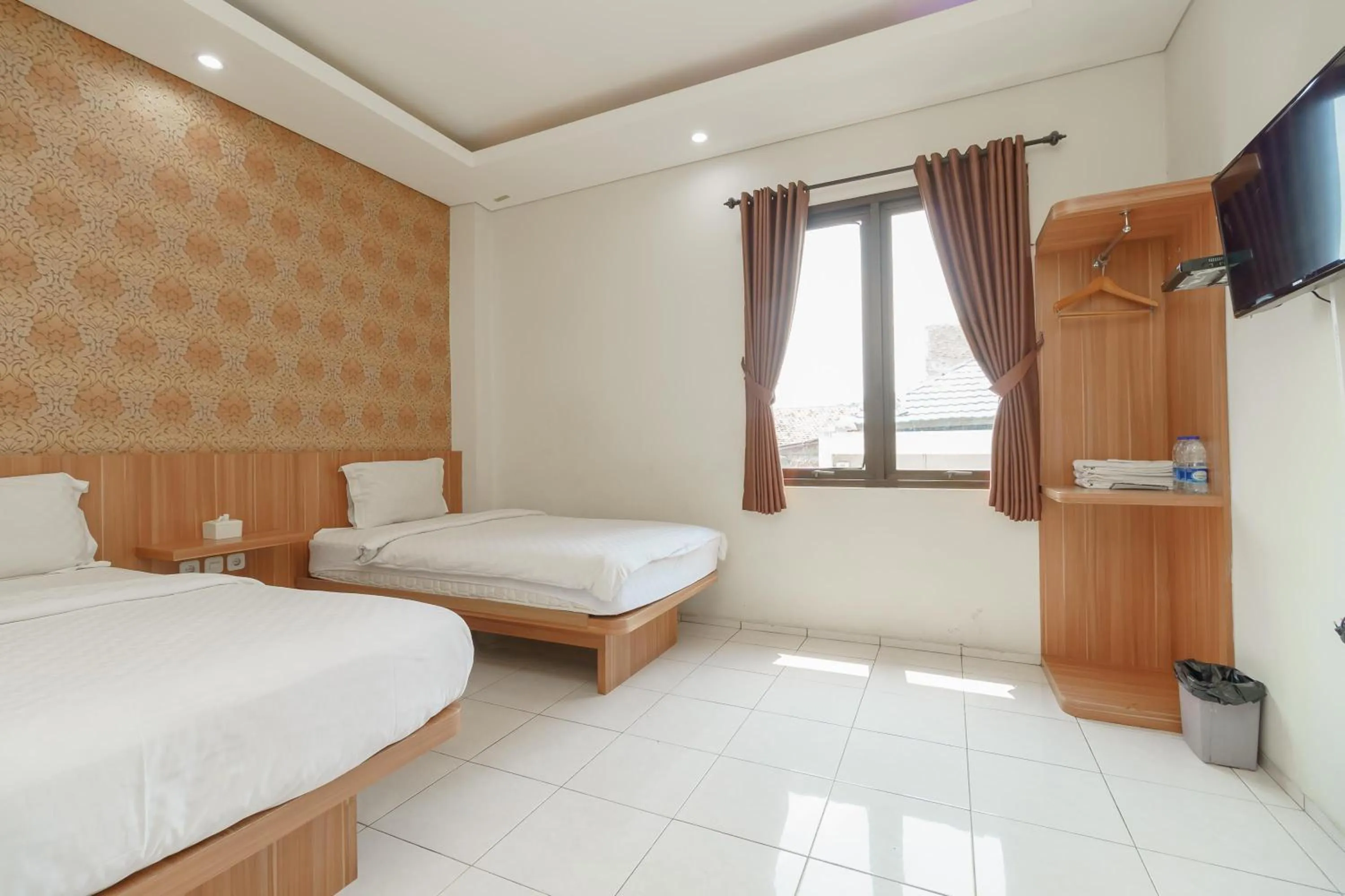 Bed in Green Apple Residence near Sarinah Mitra RedDoorz