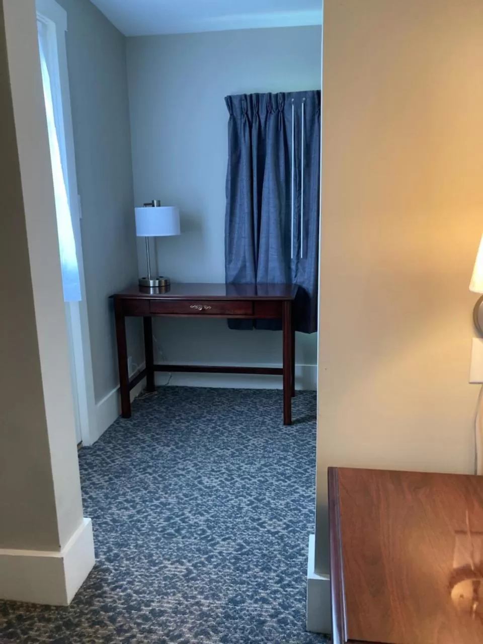 Bed in Country Squire Inn and Suites