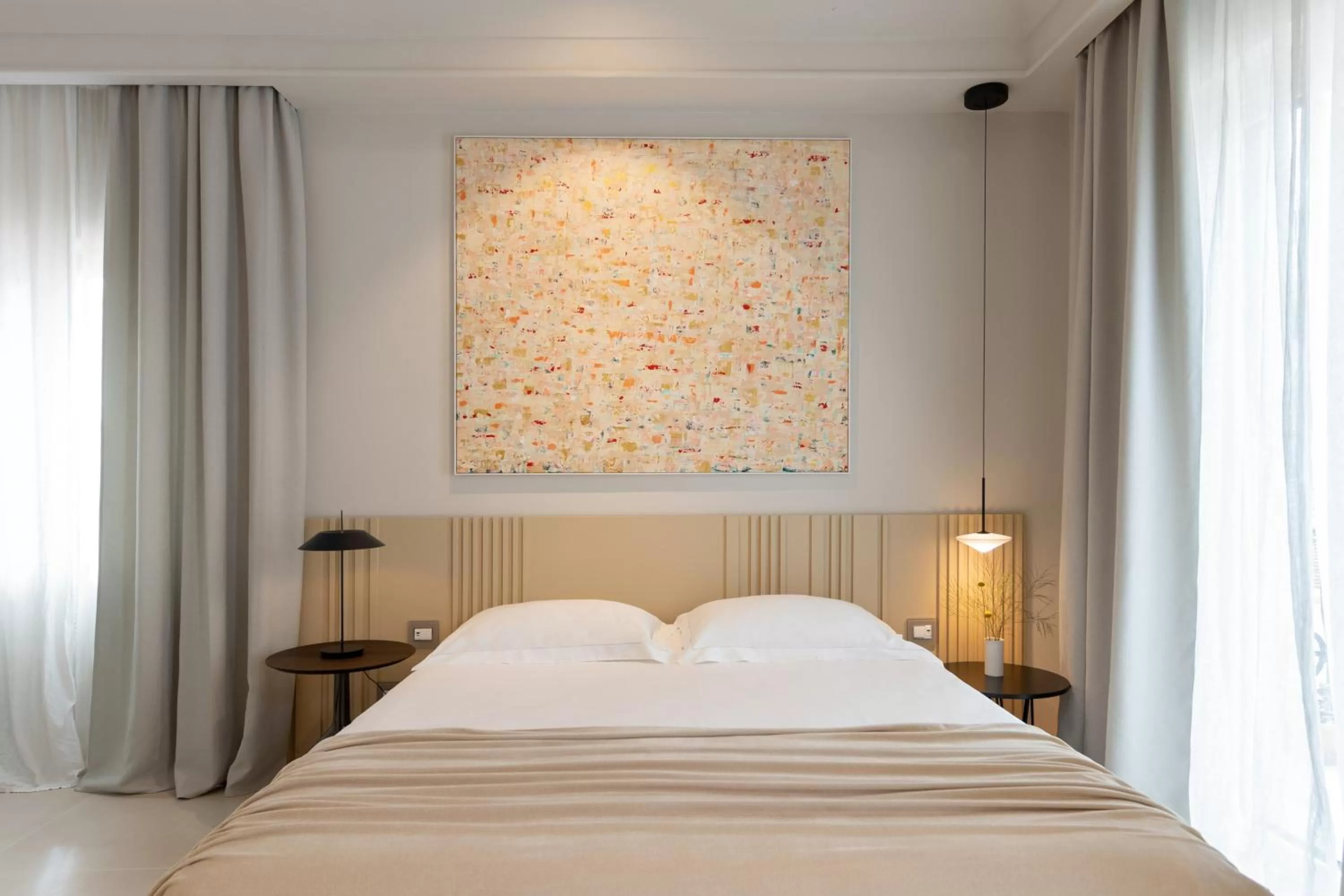 Bed in Taodomus Boutique Hotel