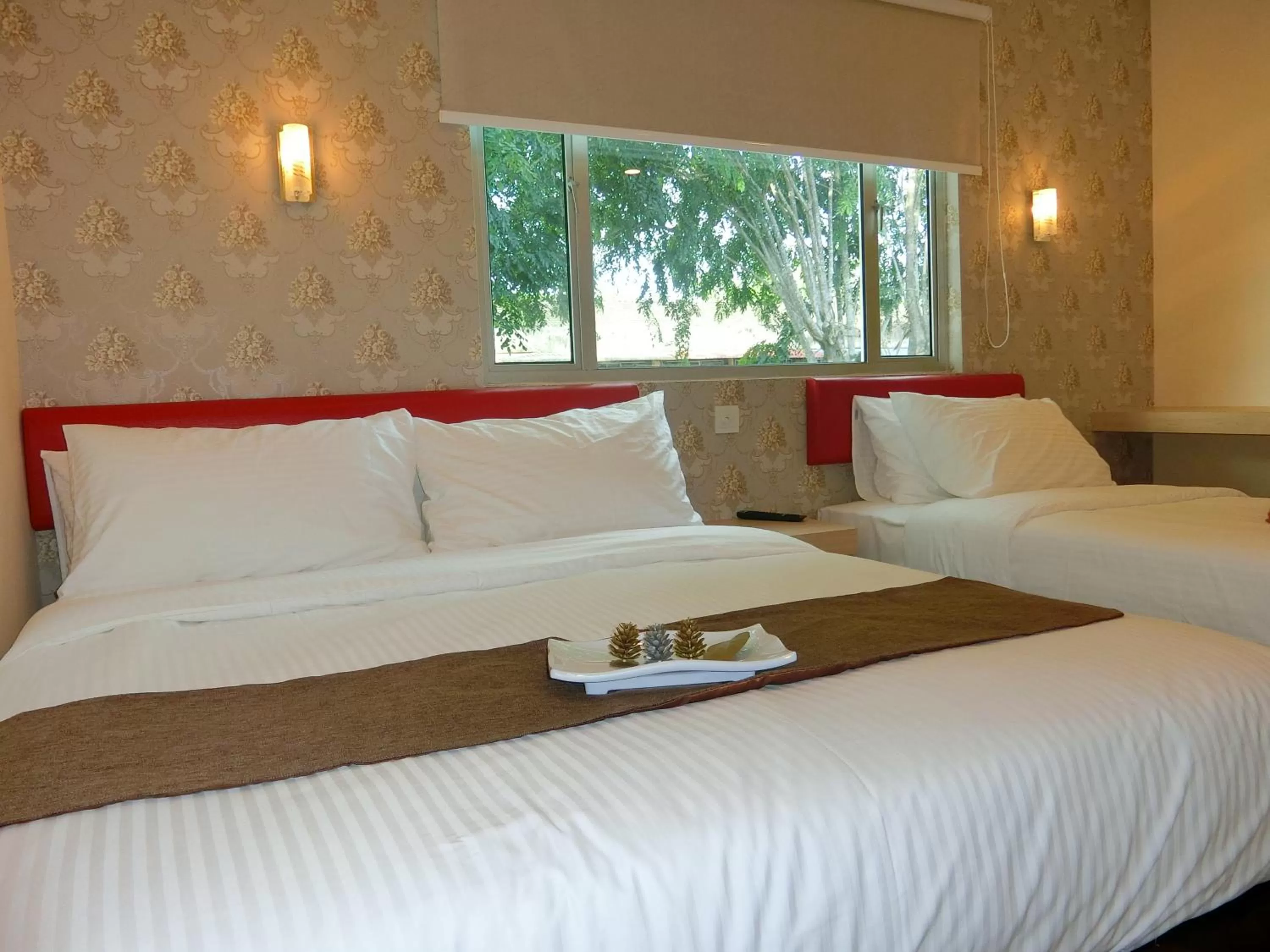 Bed in Carlsun Hotel