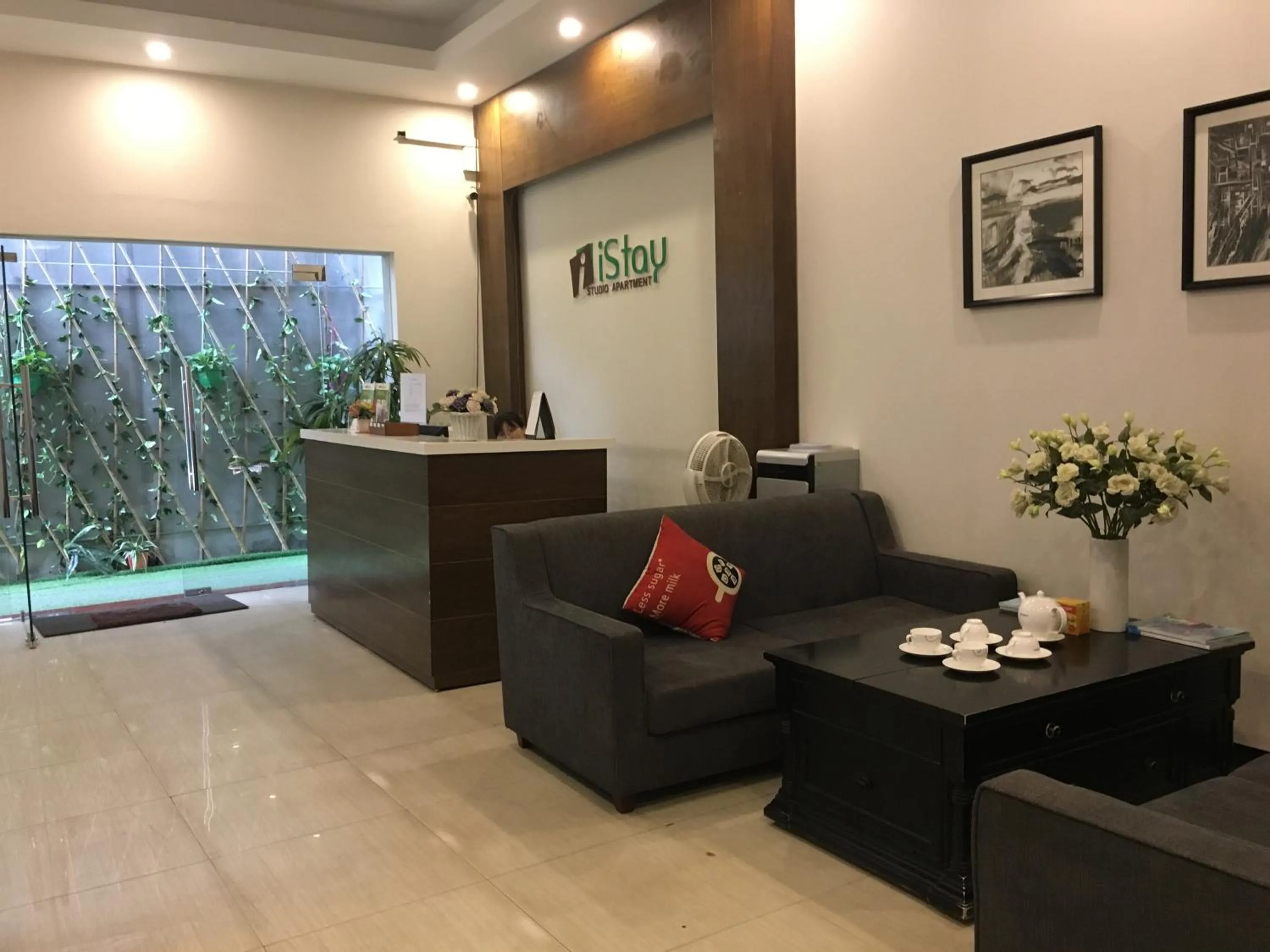 Communal lounge/ TV room in ISTAY Hotel Apartment 1