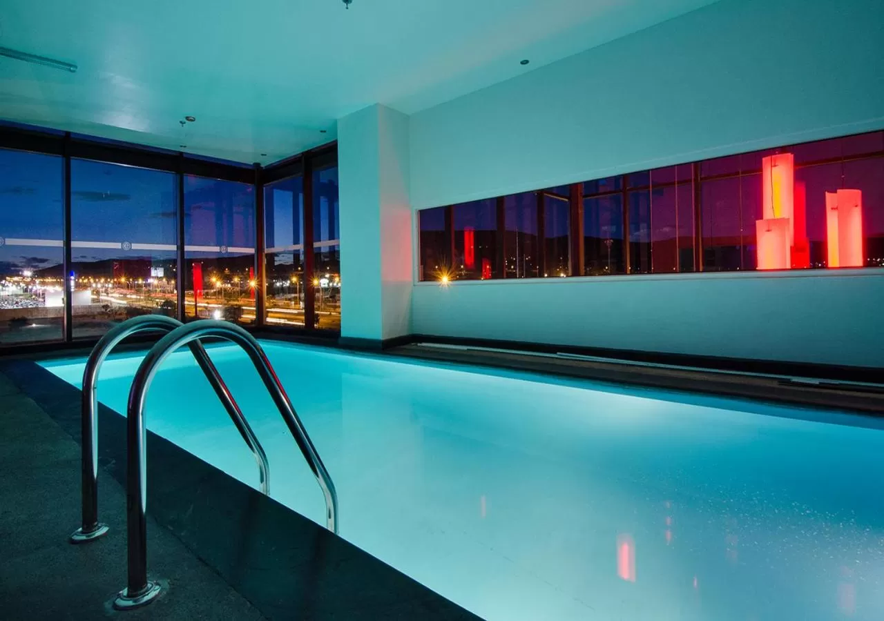 Swimming pool in Ramada Encore by Wyndham Puebla