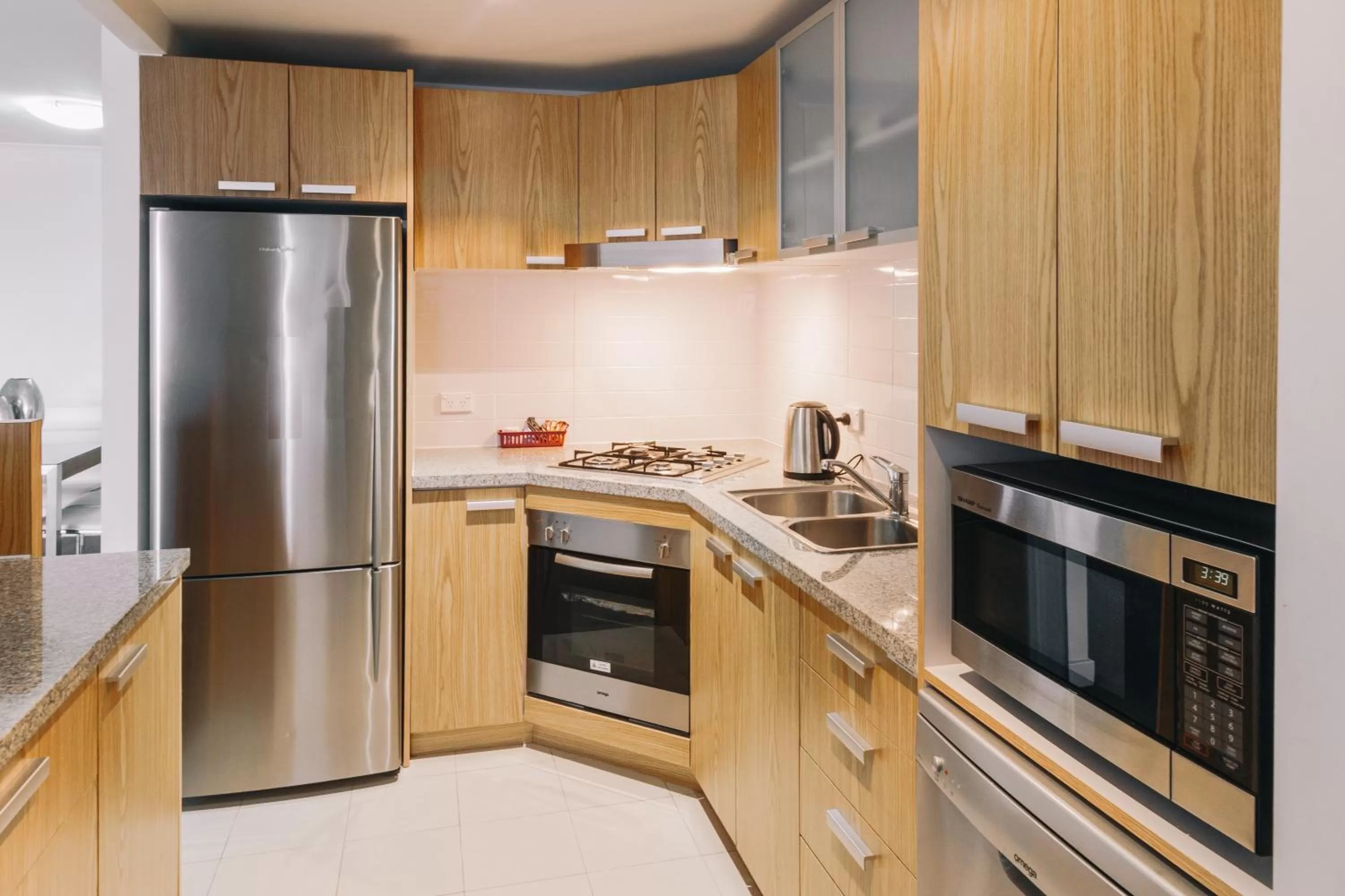 Kitchen or kitchenette in Newcastle Central Plaza Apartment Hotel Official