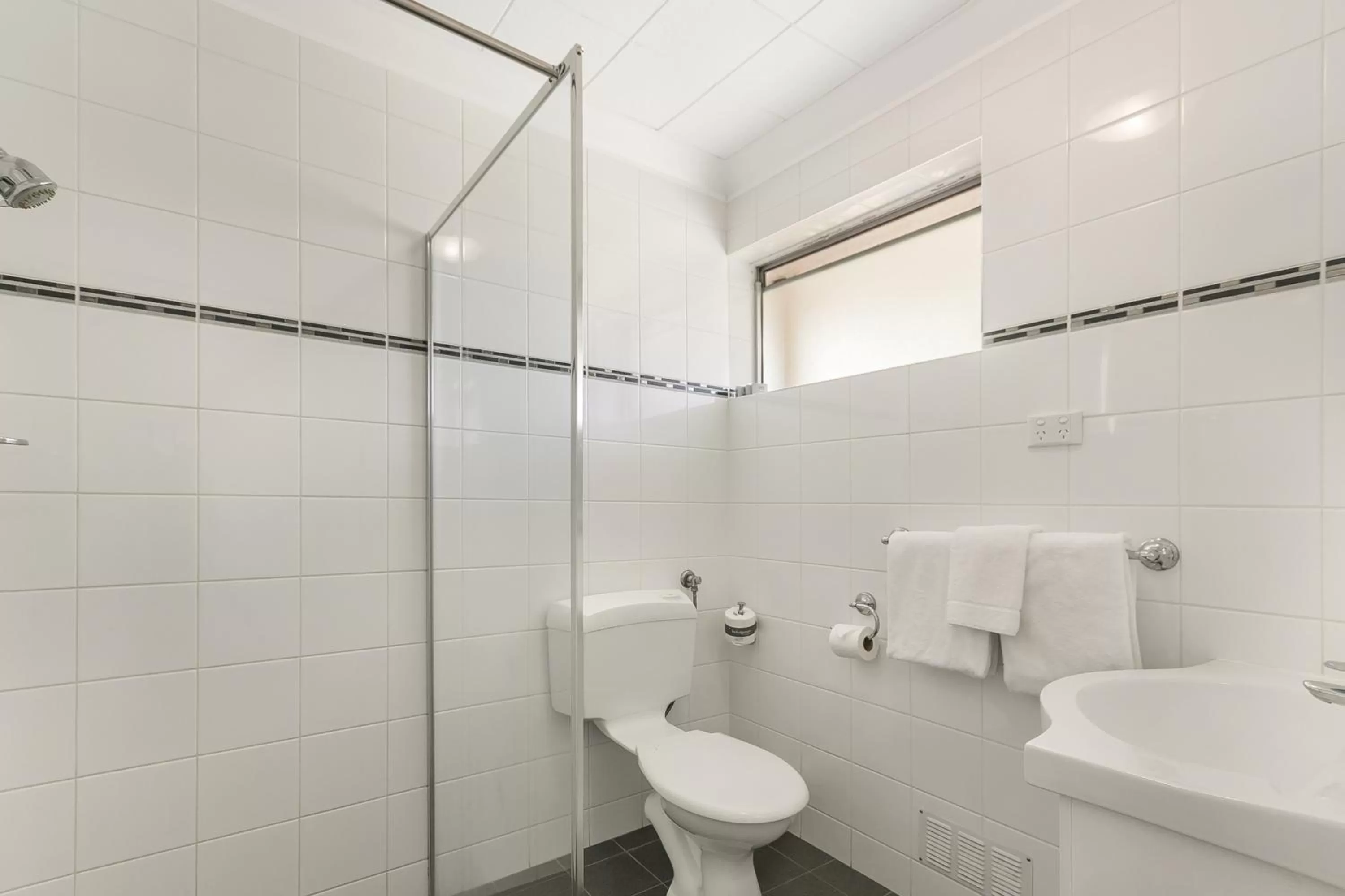 Toilet in Flag Motor Lodge