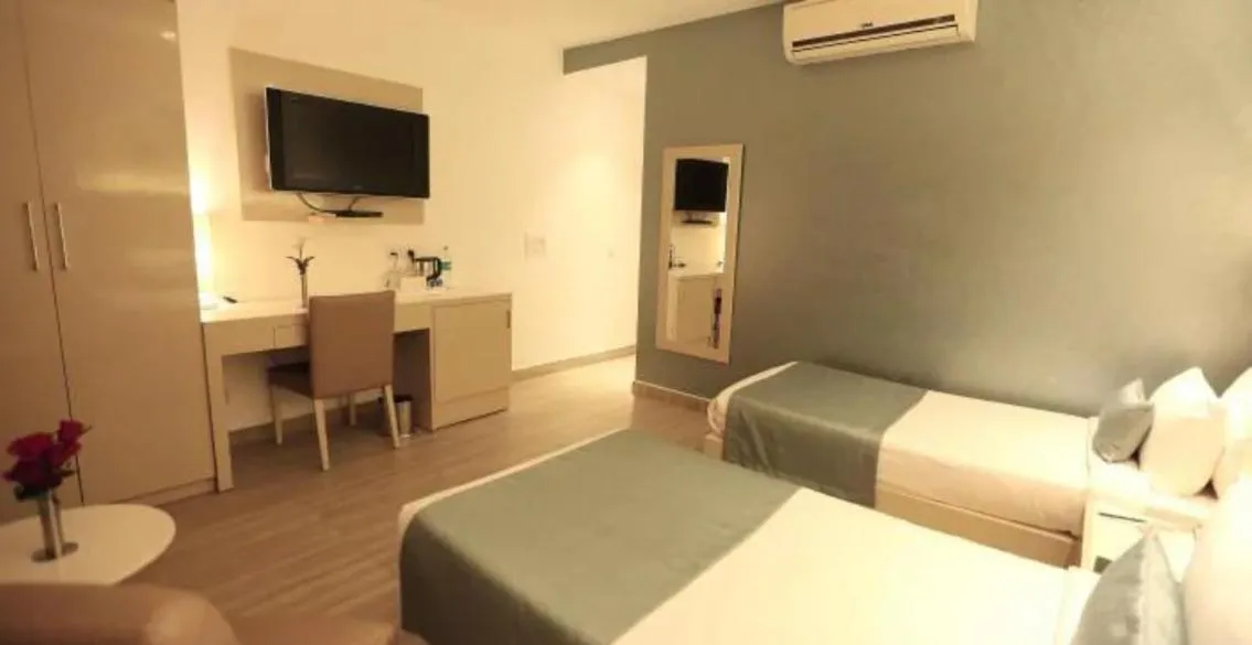 Bed in Hotel Shanti Palace