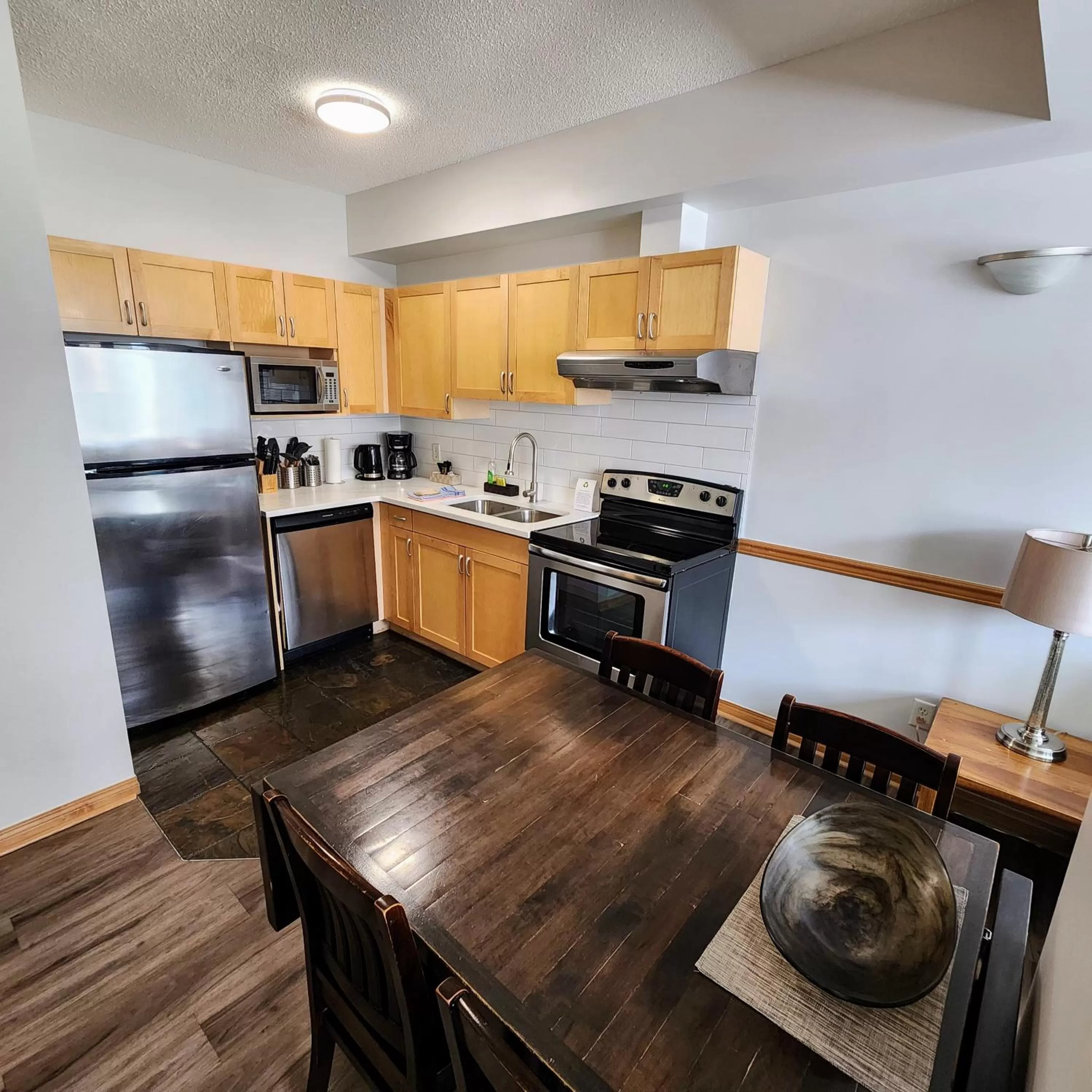 kitchen in Sunset Resorts Canmore and Spa