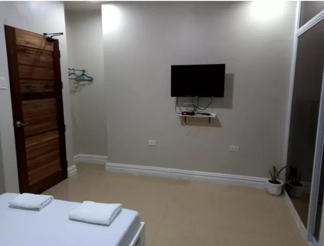 Bed in Sandscape Hotel