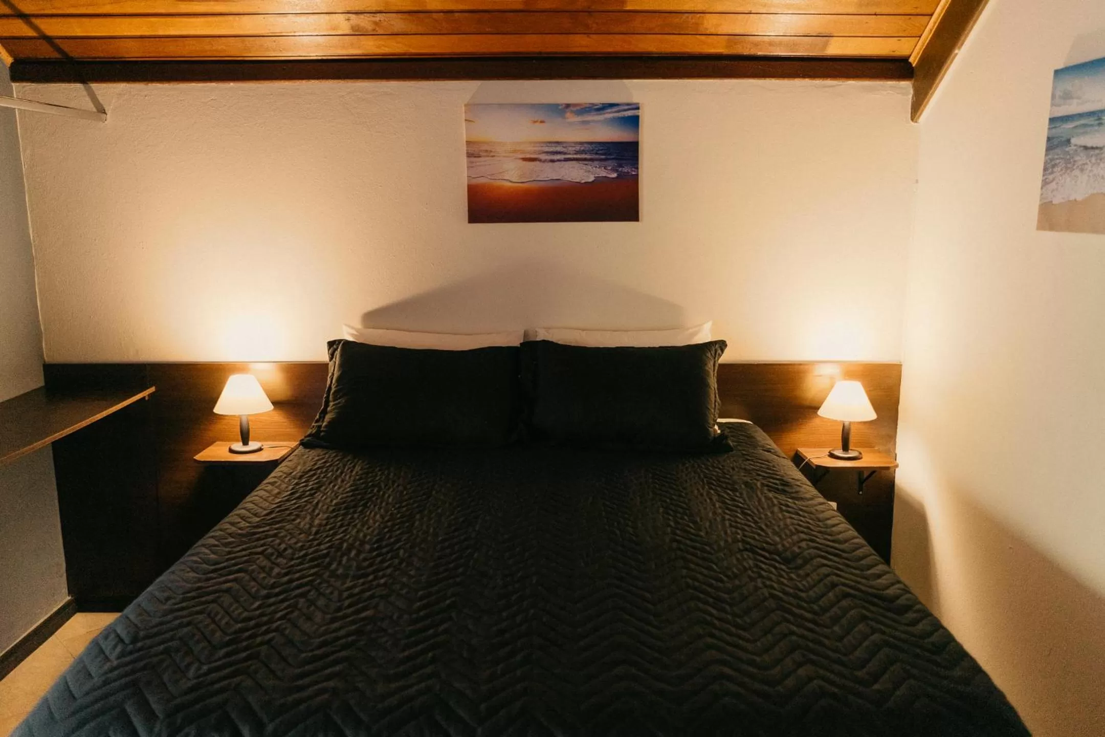 Bed in Pousada Ilha da Magia