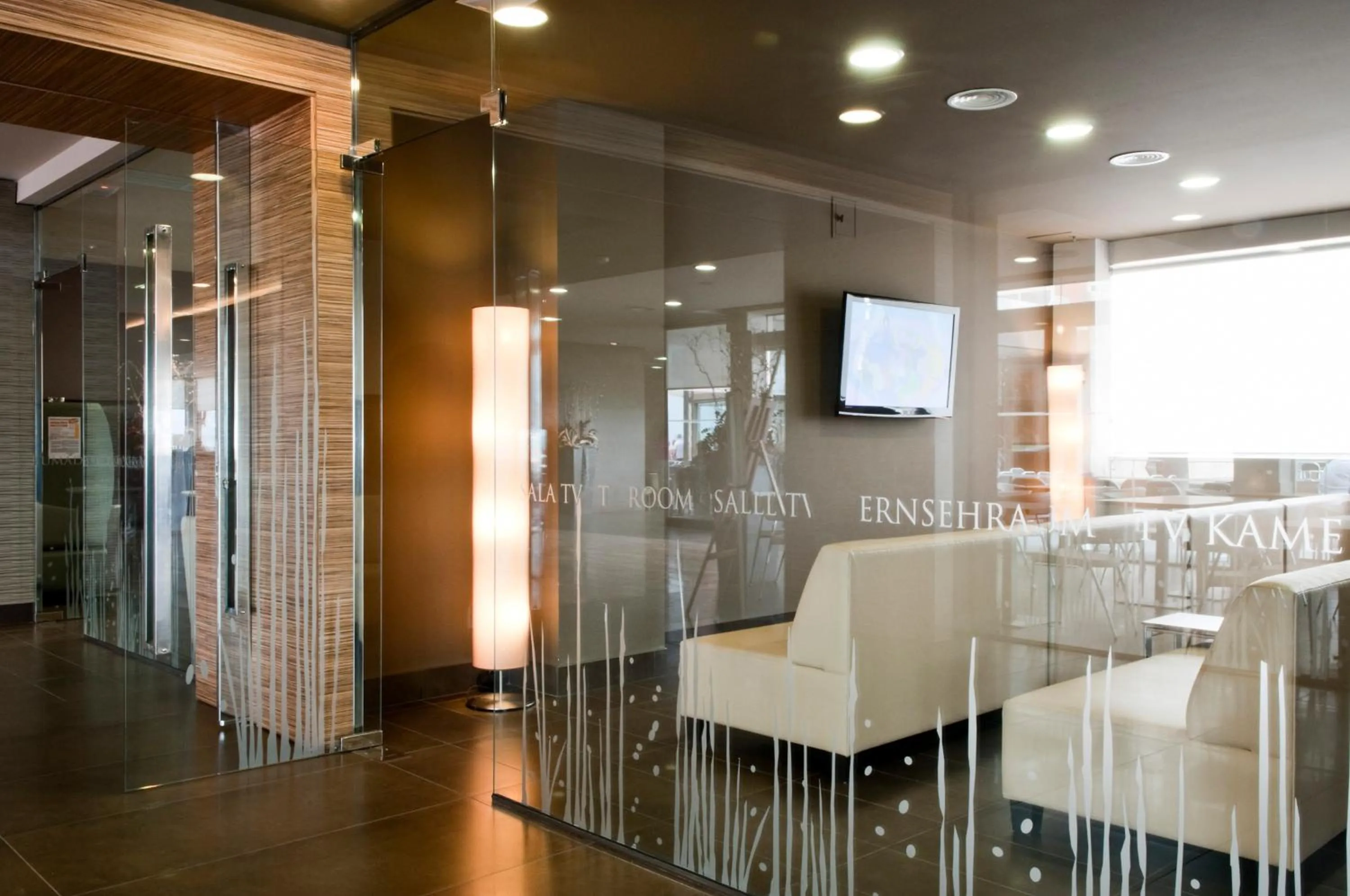 Communal lounge/ TV room in Hotel Augustus