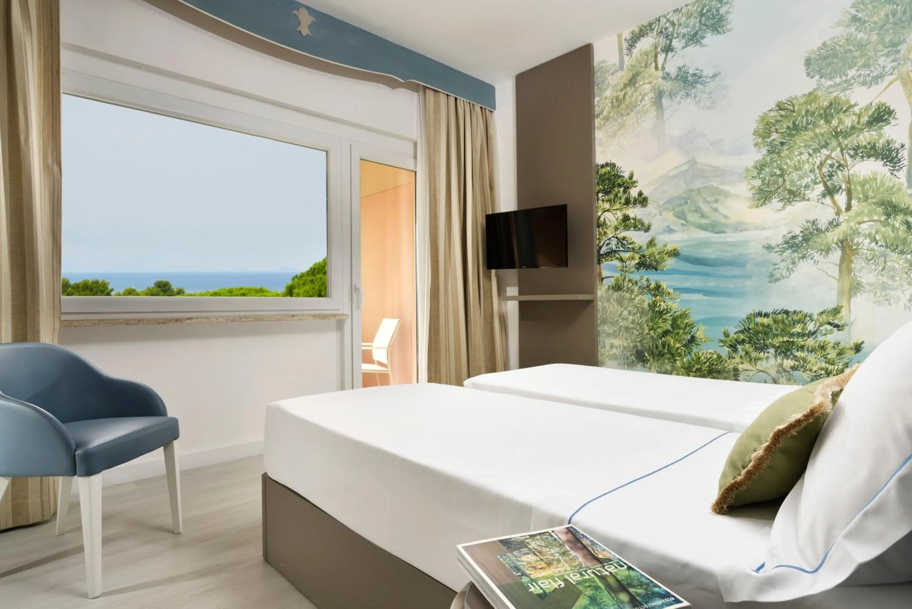 View (from property/room), Bed in Golf Hotel Punta Ala