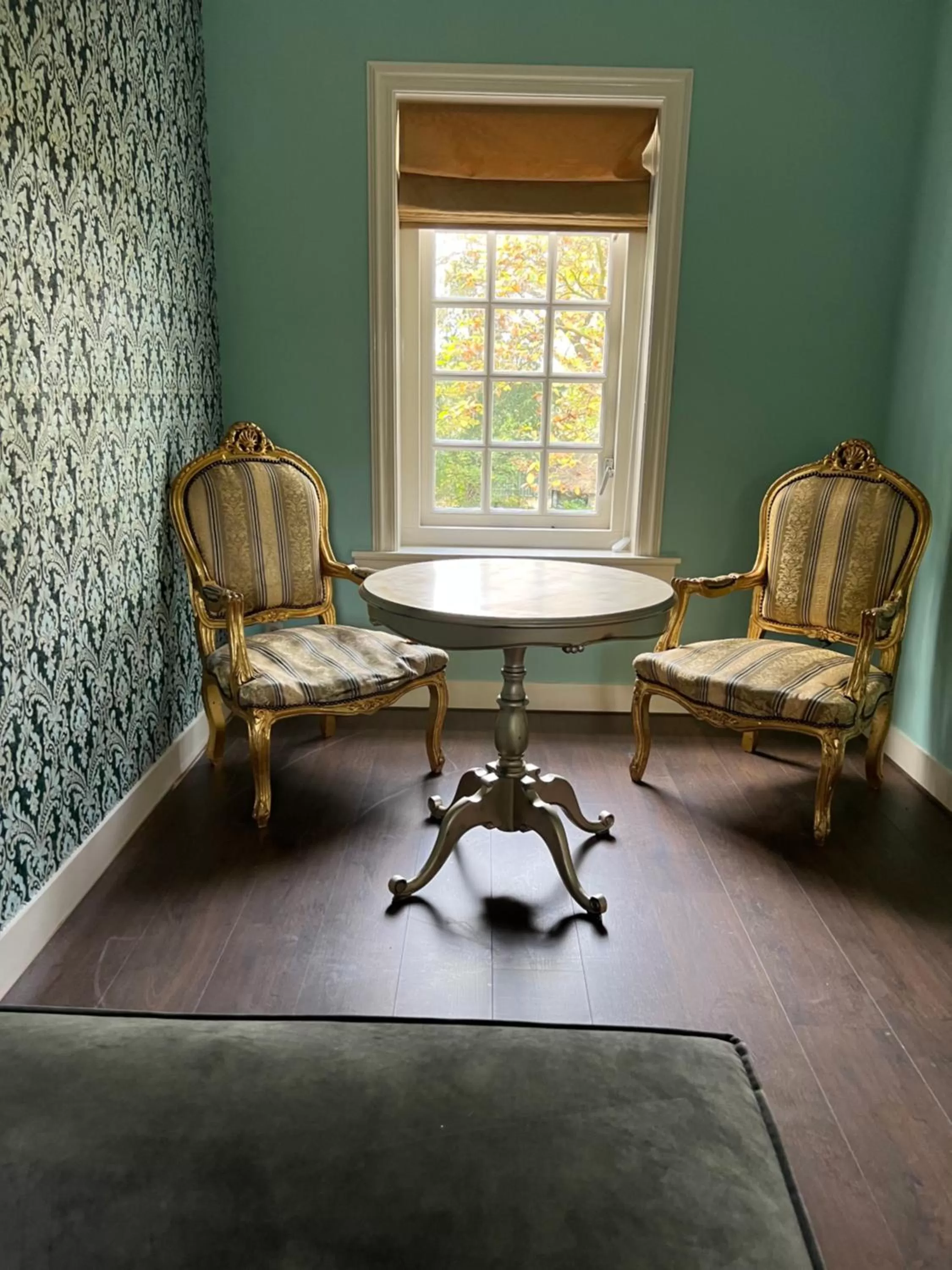 Seating Area in Cuatre Brass Stay