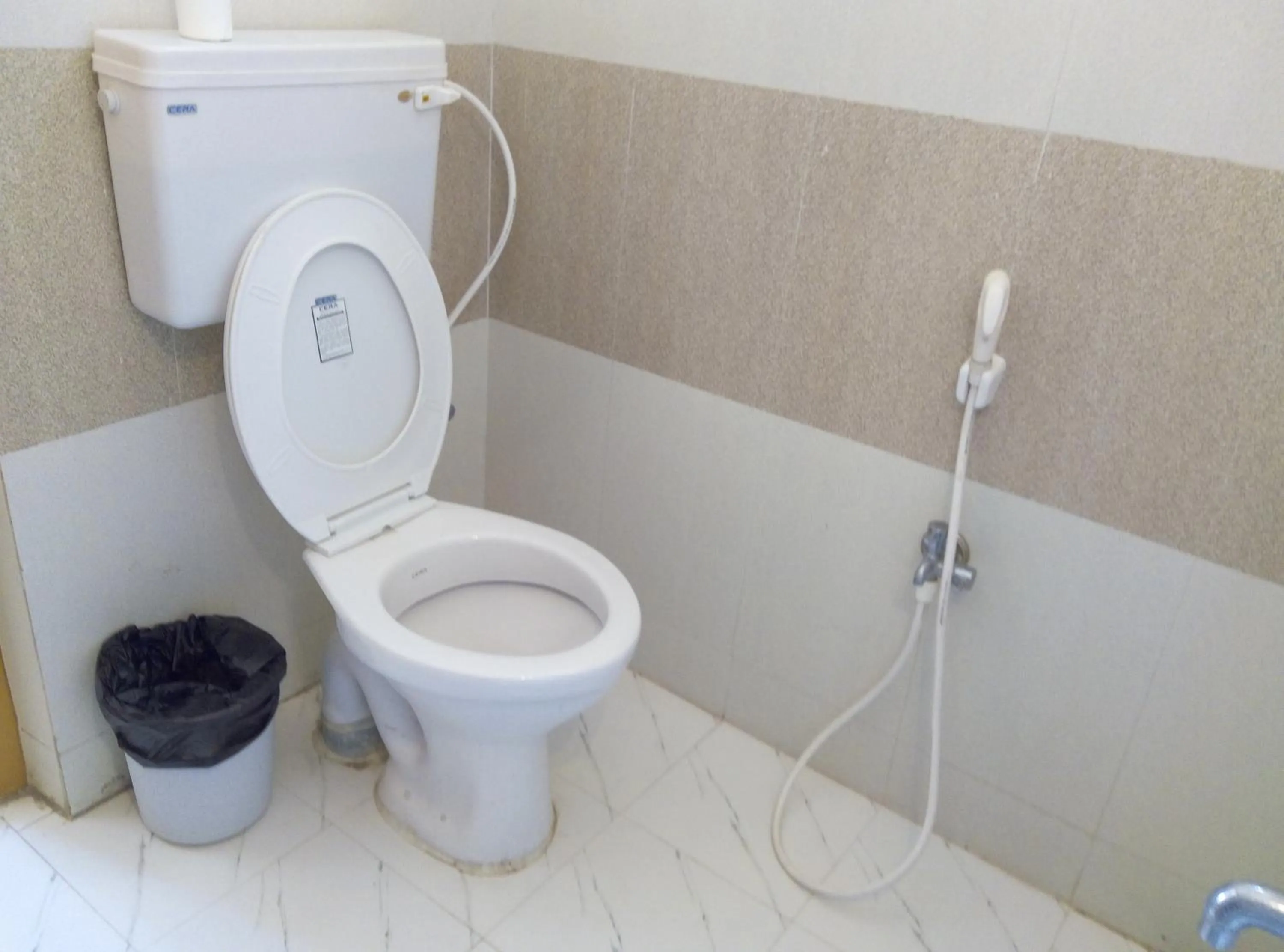 Toilet in Suvarna Residency