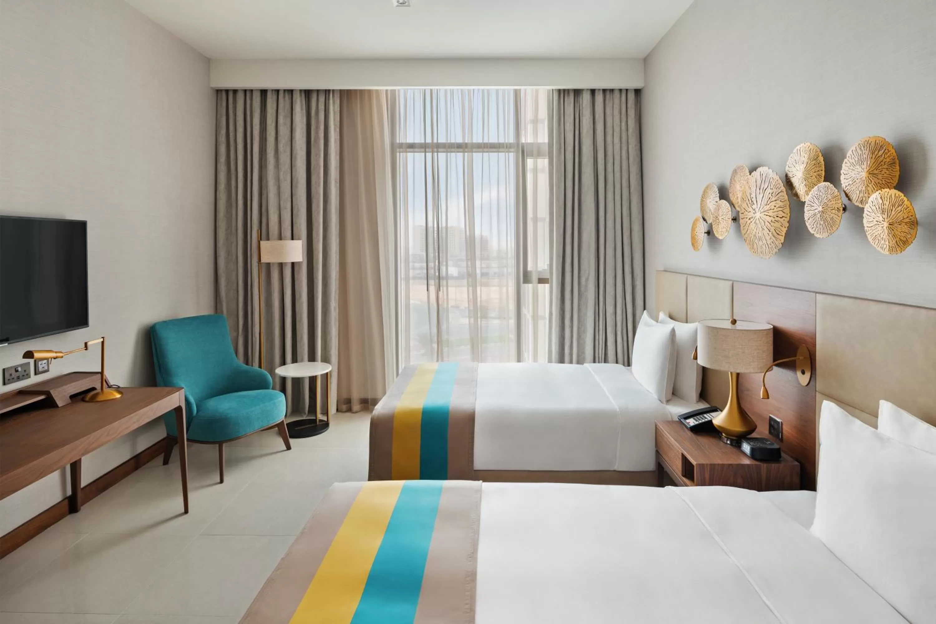 Bed in Holiday Inn Dubai Al-Maktoum Airport by IHG